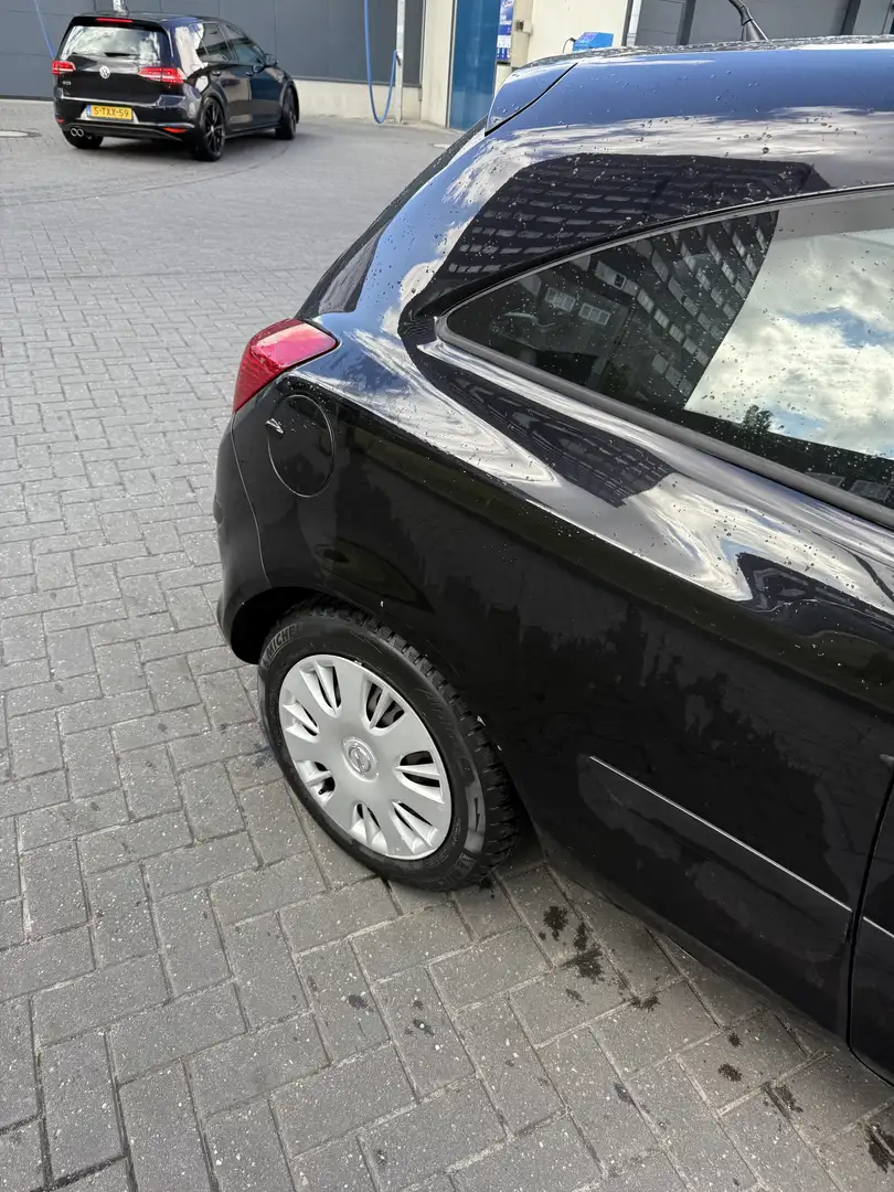Opel Corsa 1.2-16V Enjoy Zwart - 2