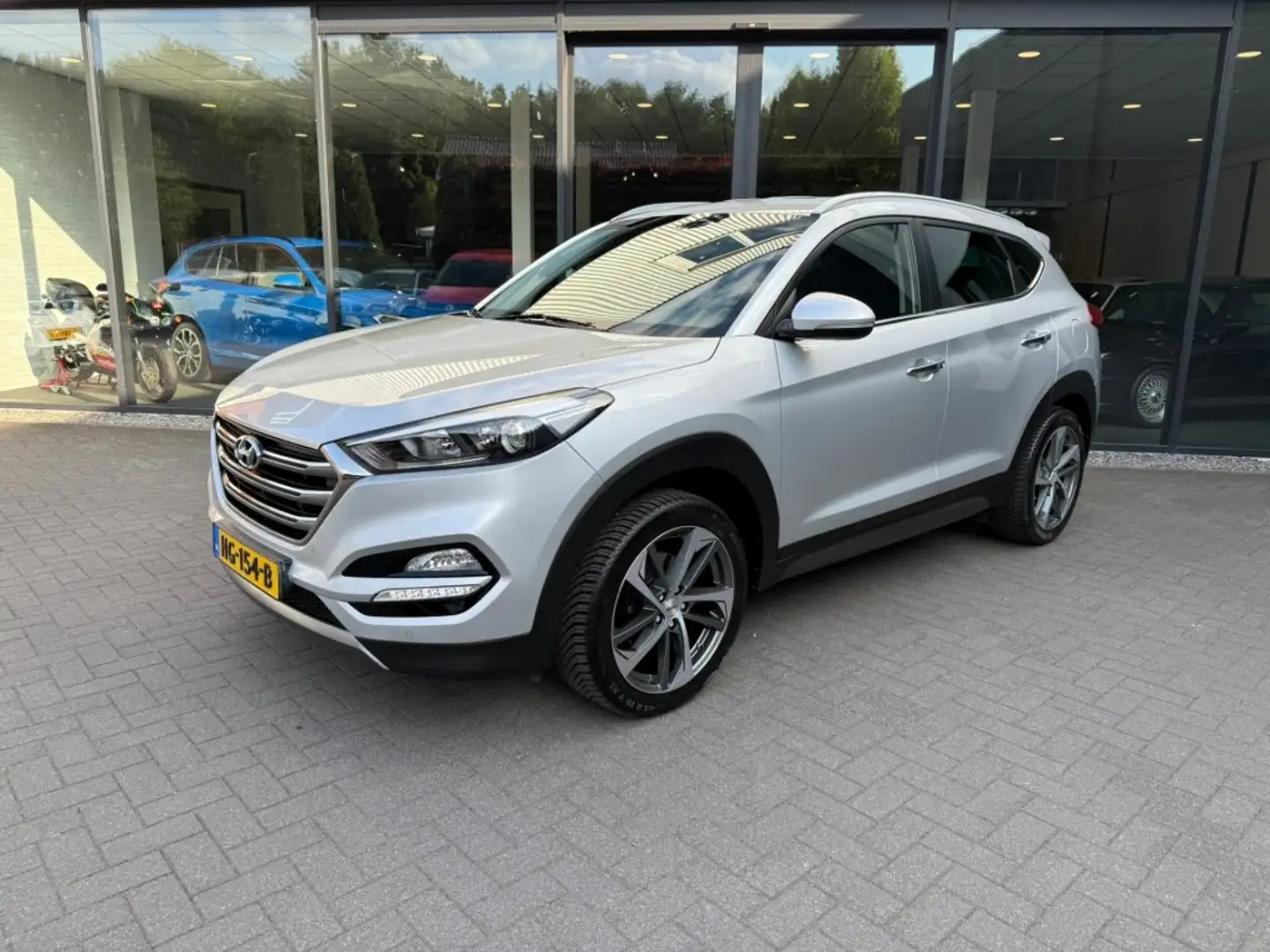 Hyundai TUCSON 1.6 GDI Comfort,Lane Ass.,Trekhk Afn.,Navi,Clima,S Gris - 1