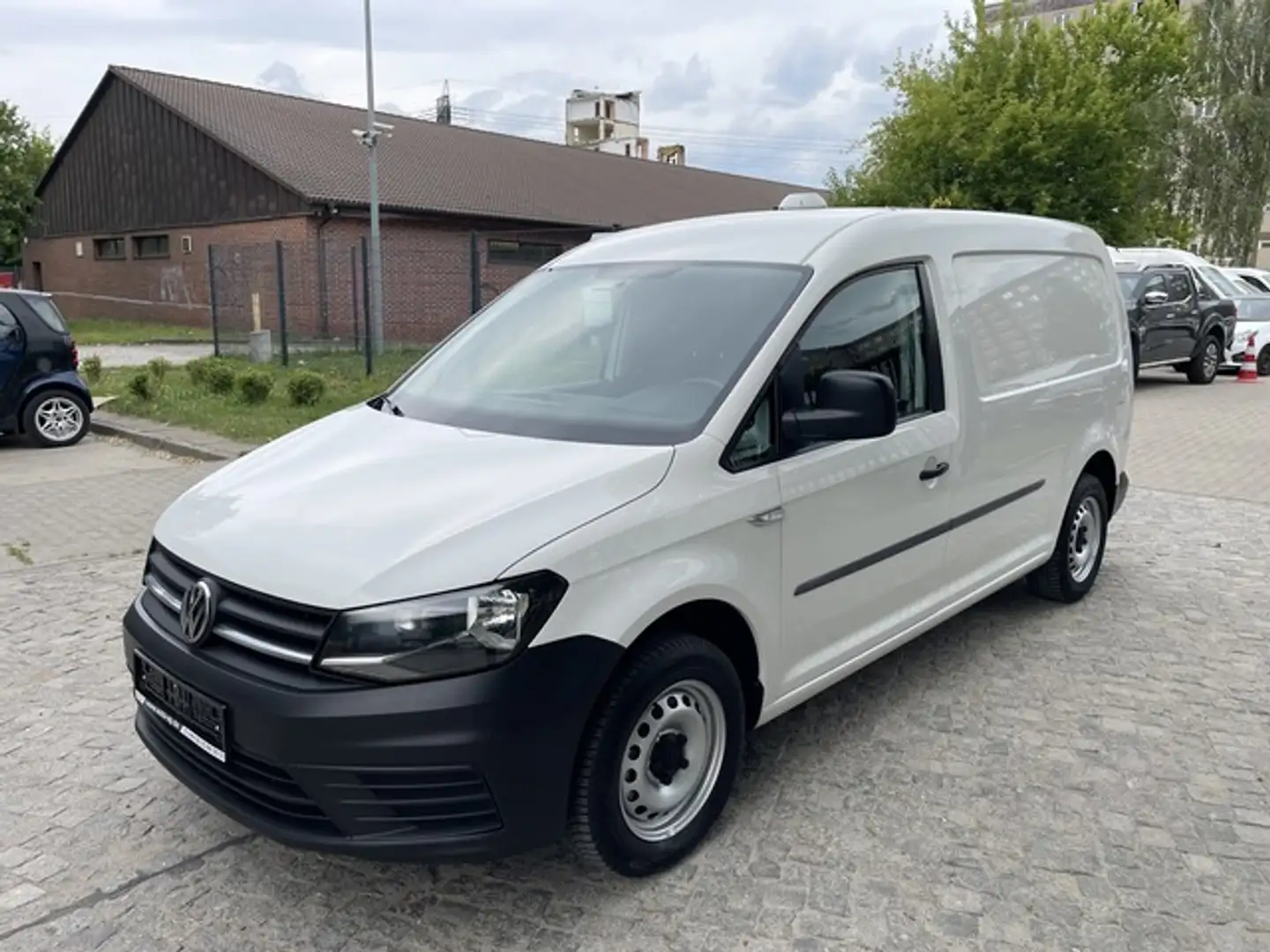 Volkswagen Caddy 2.0TDI BMT Maxi *Klima*AHK* Weiß - 1