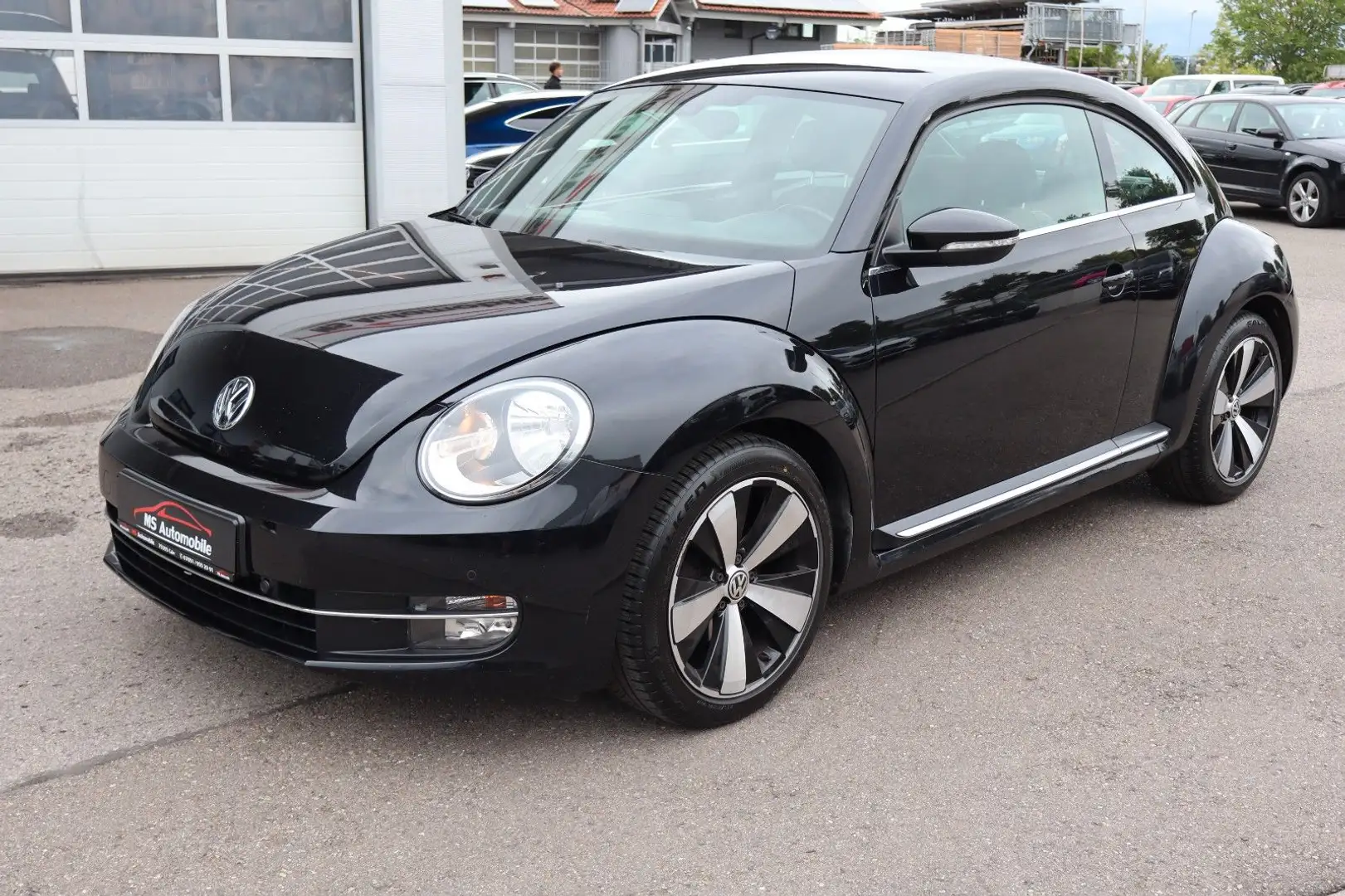 Volkswagen Beetle 1.2 TSI Design Klimaauto_Sitzhz_PDC_Alu18 Schwarz - 1