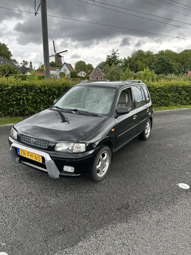 Mazda Demio 1.3 GLX - 1