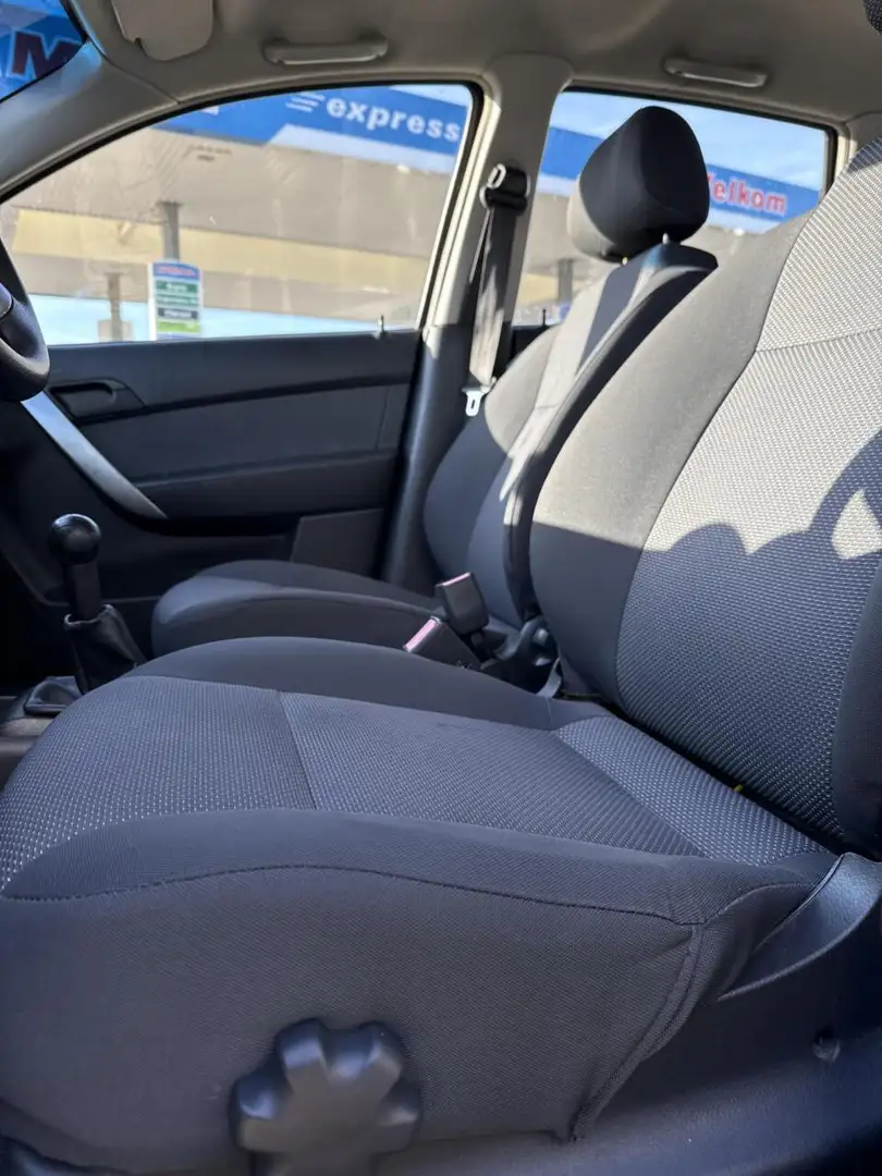 Chevrolet Aveo 1.2 16V LS B-clever, airco, lm-velgen. isofix, afk Schwarz - 2