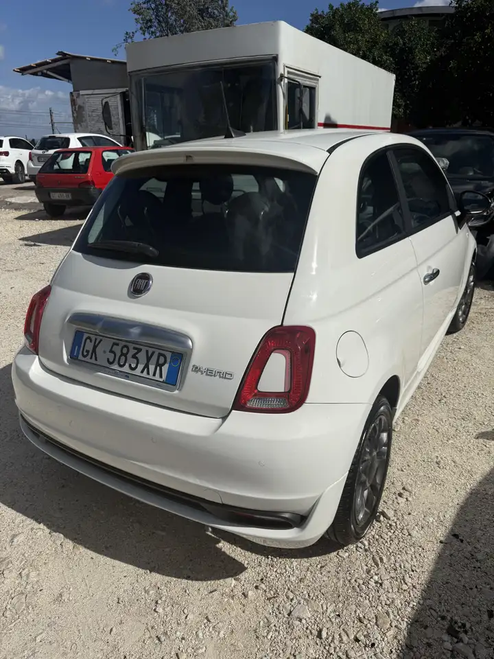 Fiat 500C 1.0 hybrid (Red) 70cv — photo 1 of 8
