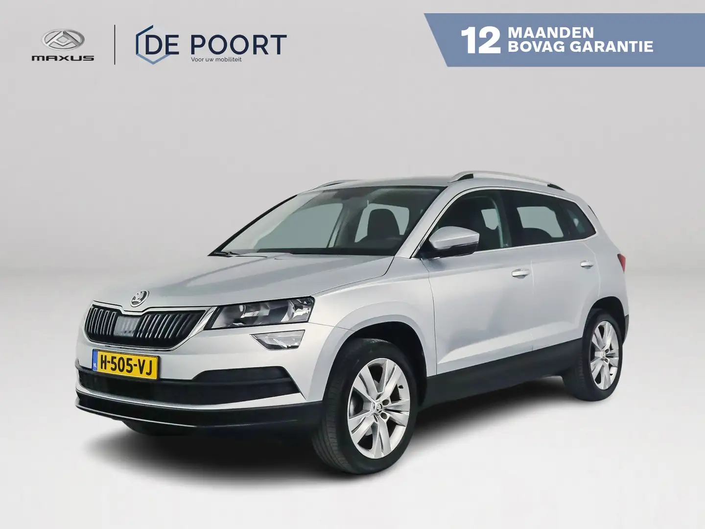 Skoda Karoq 1.0 TSI Ambition Business Aut. | Stoelverw.| Navig Grau - 1