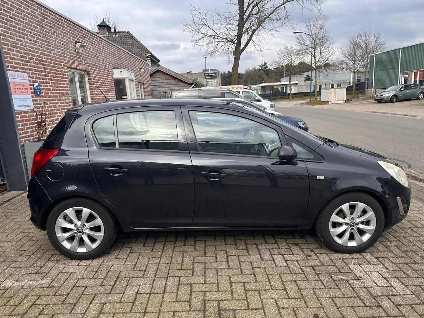 Opel Corsa 1.2-16V Anniversary Edition airco*leder*cruise con Zwart - 2