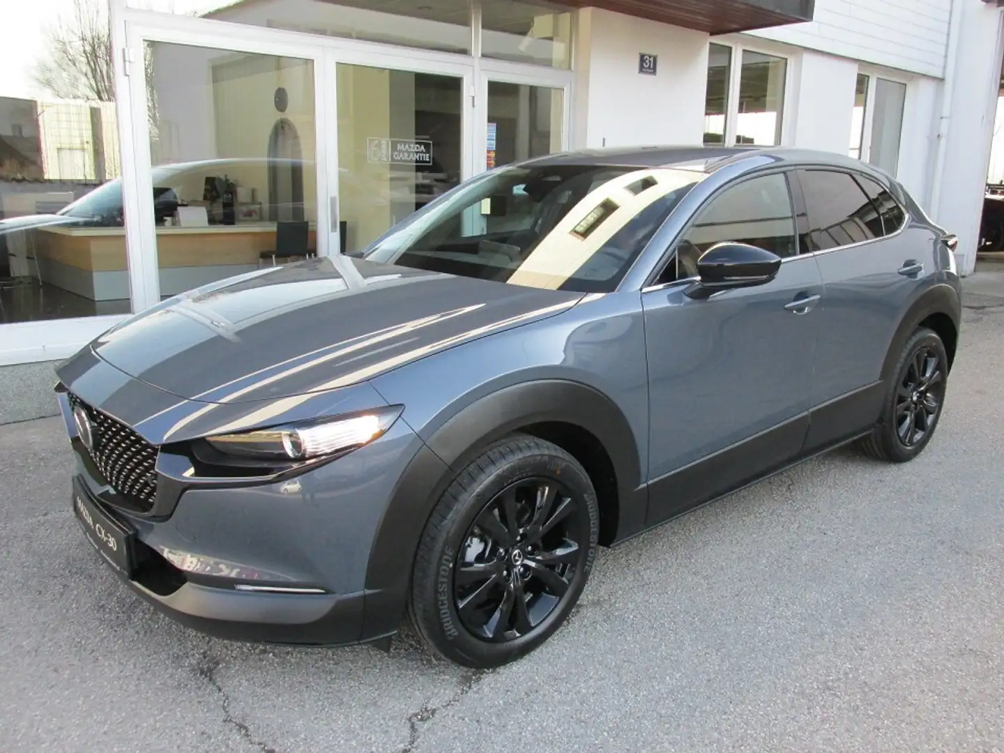Mazda CX-30 e-Skyactive G140 Nagisa Grau - 1