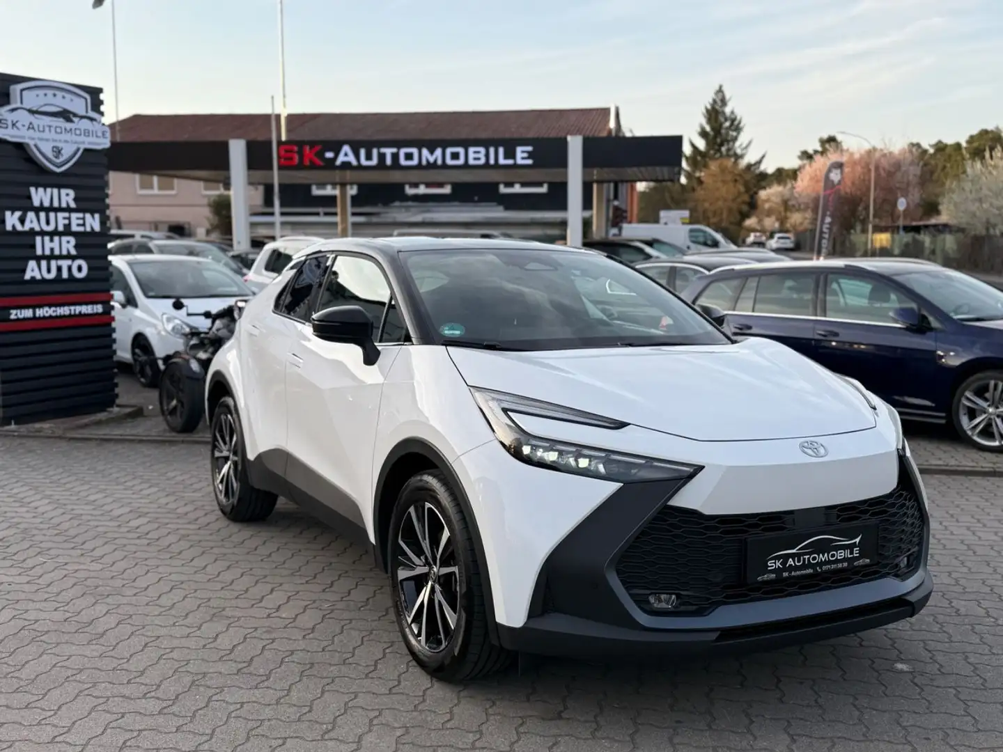 Toyota C-HR Hybrid TeamD 1.HND-GARANTIE-LANE-ACC-RFK-SZ Schwarz - 1
