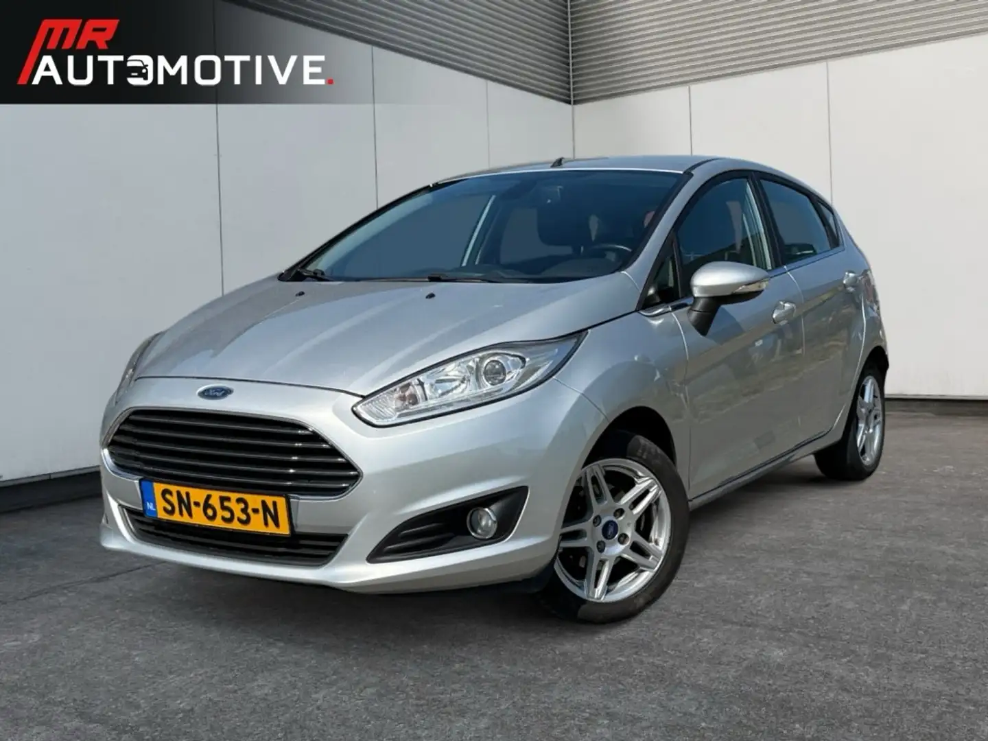Ford Fiesta 1.0 Titanium - Airco, Cruise, Parkeersensoren, Lic Gris - 1