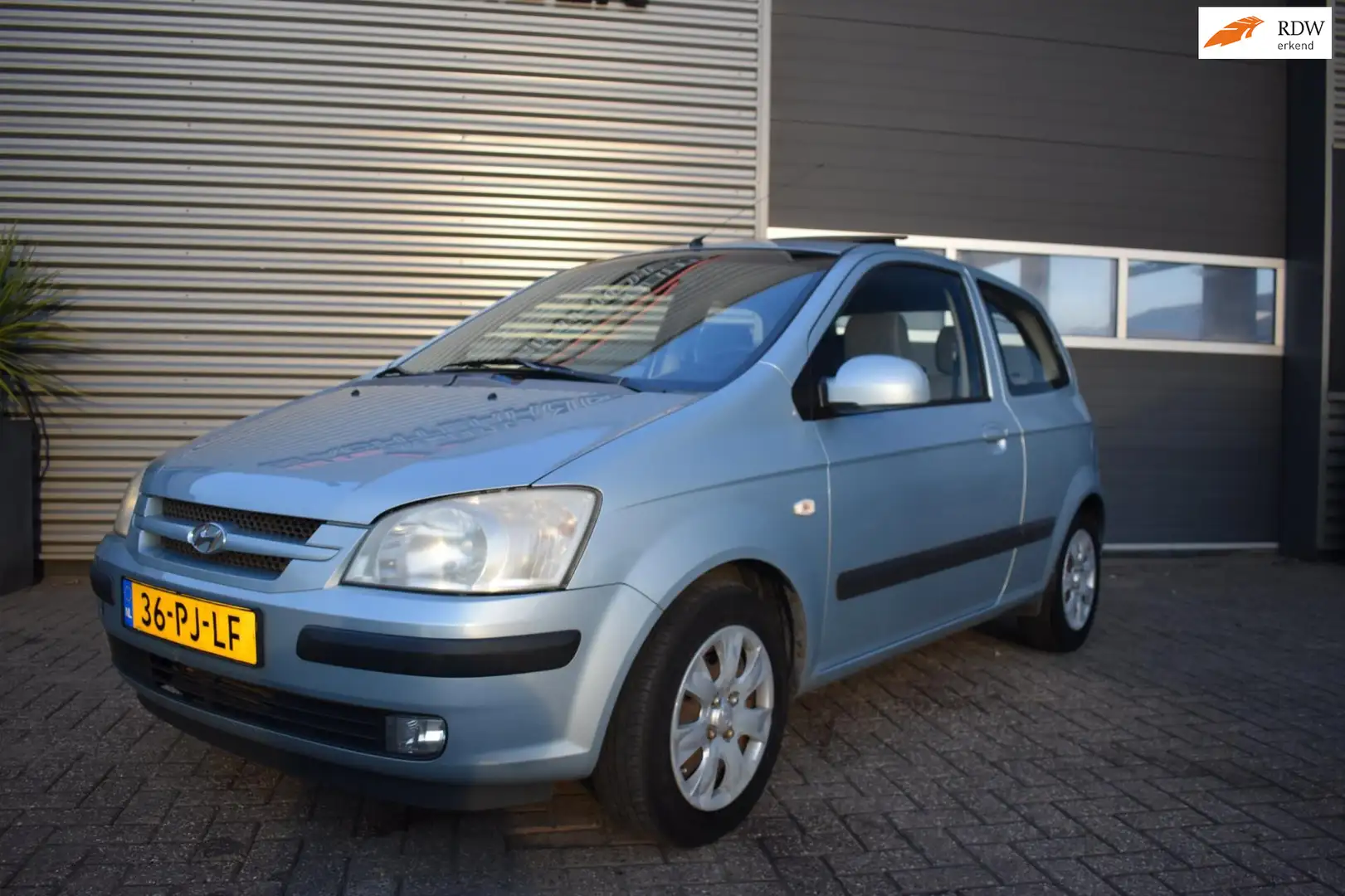Hyundai Getz 1.3i GLS Sky Airco / schuif/kanteldak!!! Blau - 1