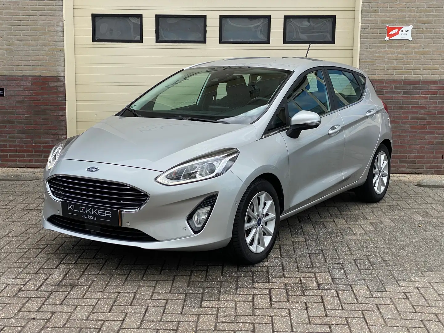 Ford Fiesta 1.0 EcoBoost Titanium 12 MND garantie | 1E EIG | D Gris - 1