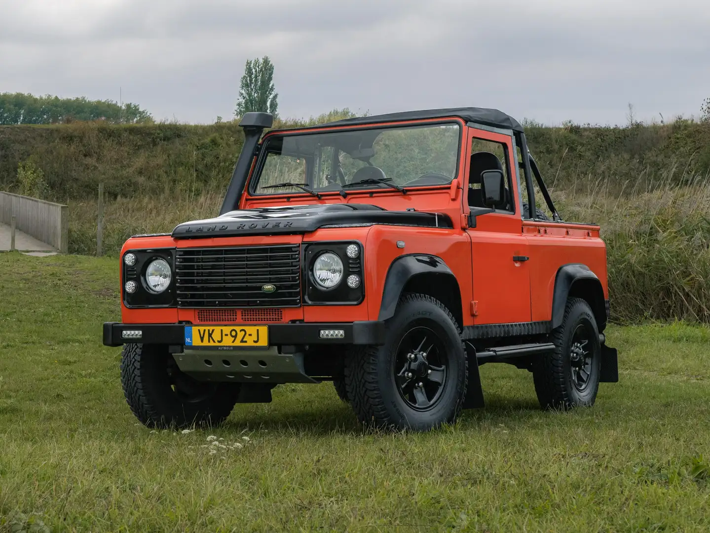Land Rover Defender Defender Soft-Top 2.4 TD T.90" E Orange - 1
