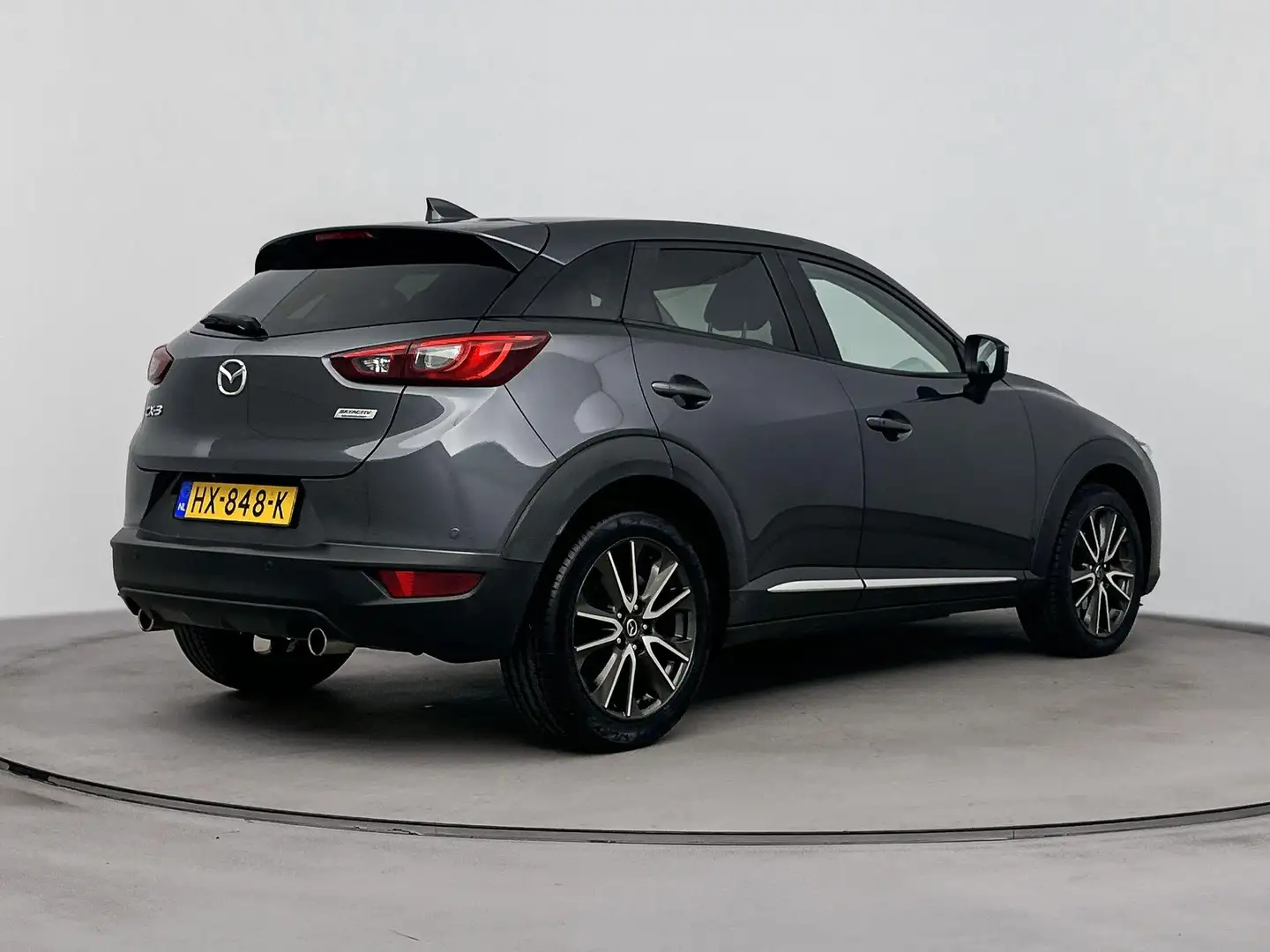Mazda CX-3 2.0 SkyActiv-G 120 GT-M | Lage km-stand! | Leer | Gris - 2