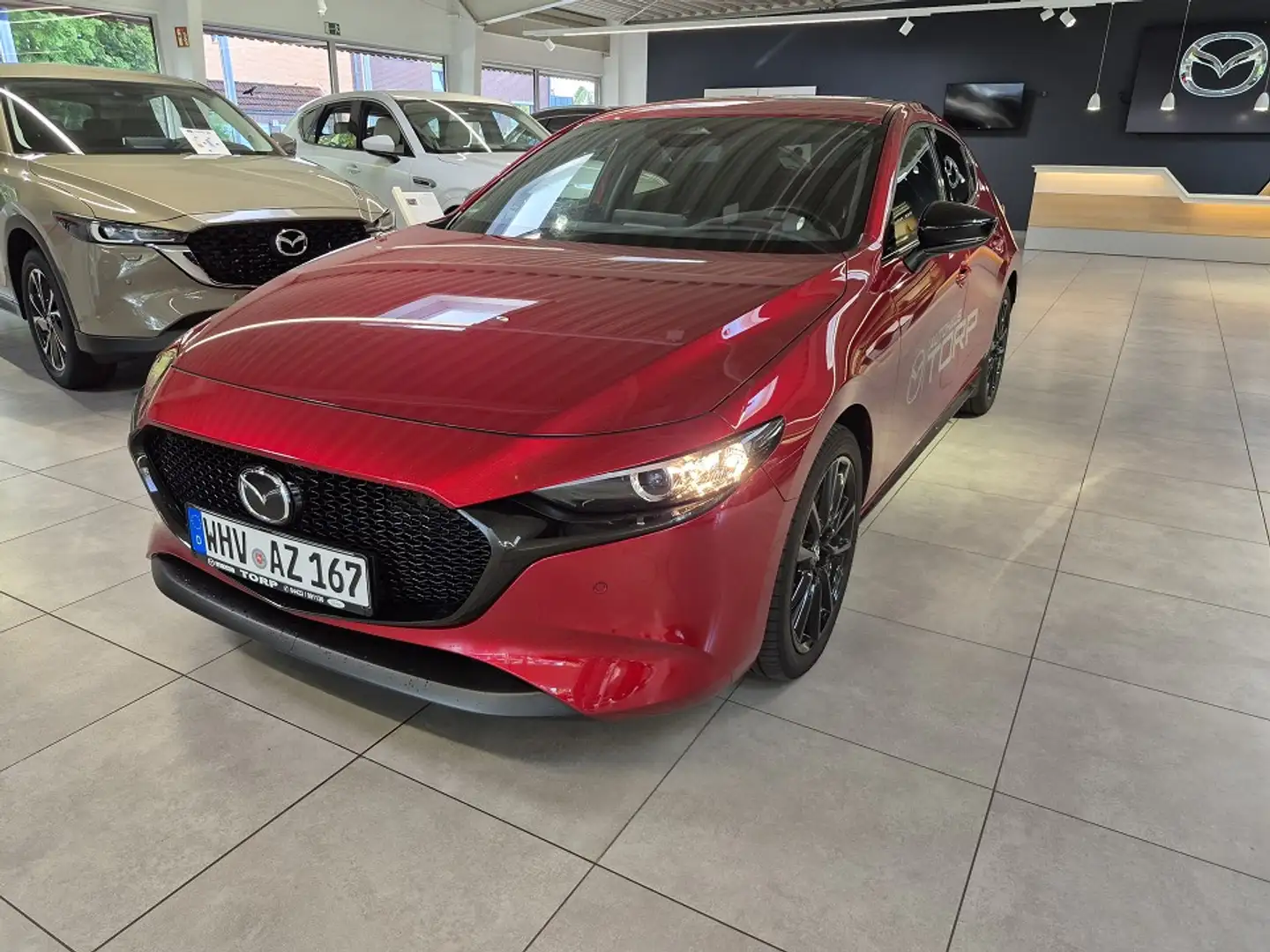 Mazda 3 2025 2.5 l G 140 PS Homura Rot - 1