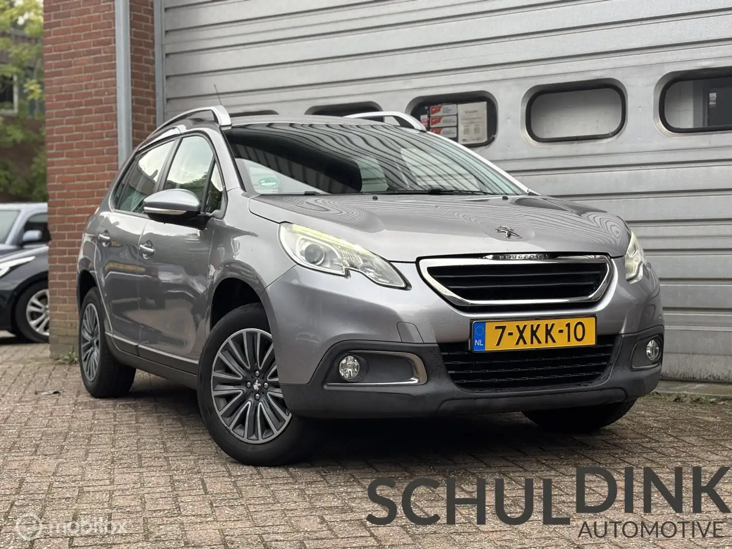 Peugeot 2008 1.2 PureTech Blue Lease AIRCO|TREKHAAK|CRUISE Grijs - 1