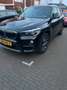 BMW X1 sDrive18i Centennial High Executive Panoramadak | Zwart - thumbnail 1