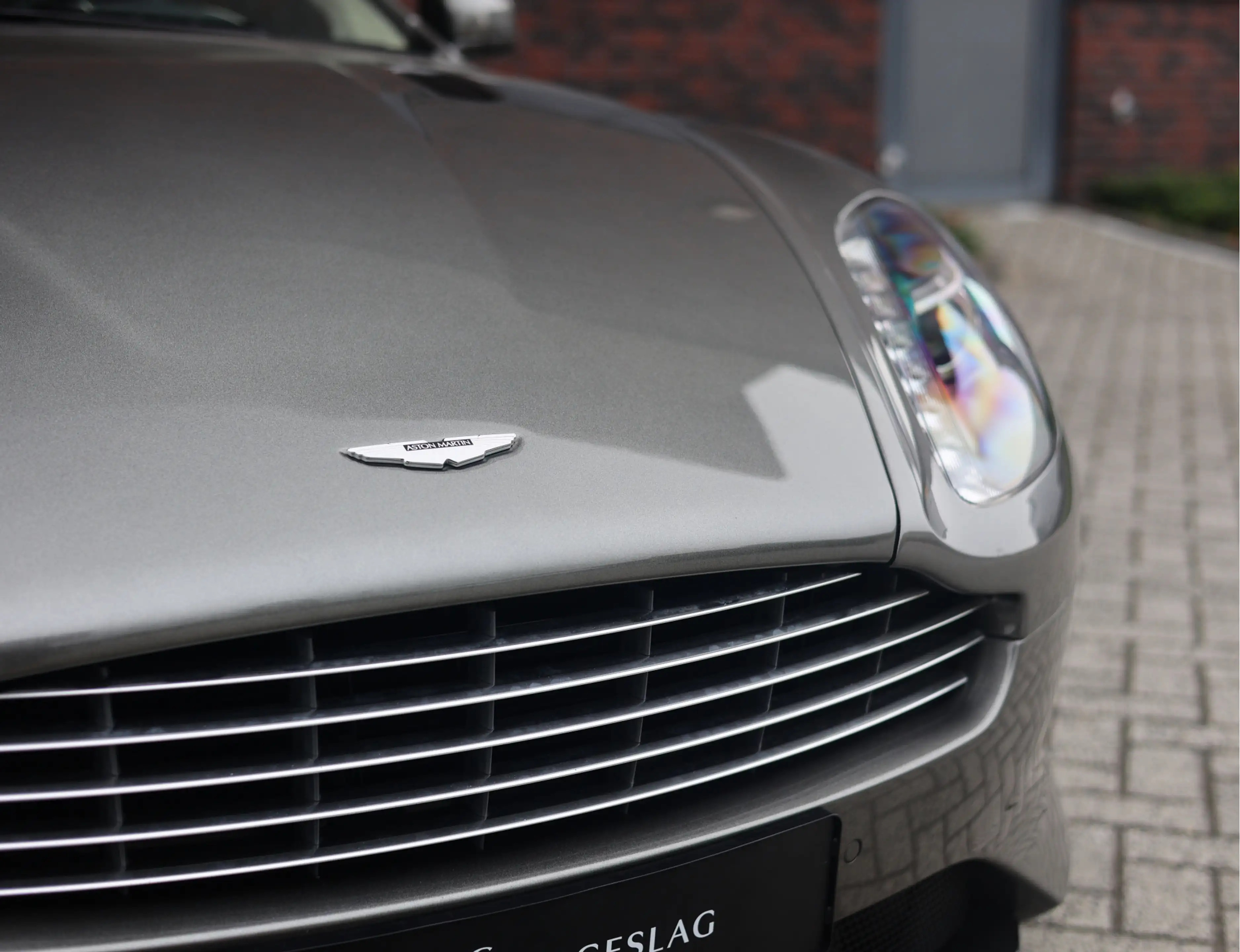 Aston Martin DB9 5.9 V12 GT | Scintilla Silver - One-77 stuur — photo 9