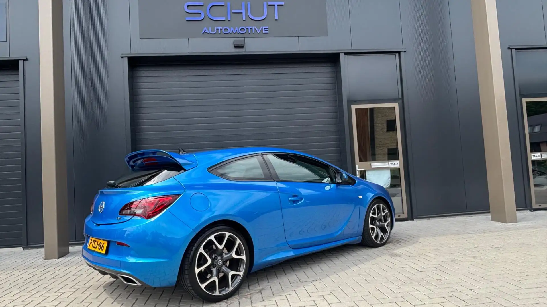 Opel Astra GTC 2.0 Turbo OPC 280pk ORIG NL AUTO | LEER | XENO Blauw - 2