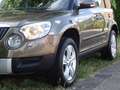 Skoda Yeti 1.2 TSI Tour met Navi en Trekhaak Bruin - thumbnail 4