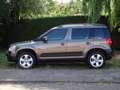 Skoda Yeti 1.2 TSI Tour met Navi en Trekhaak Bruin - thumbnail 2