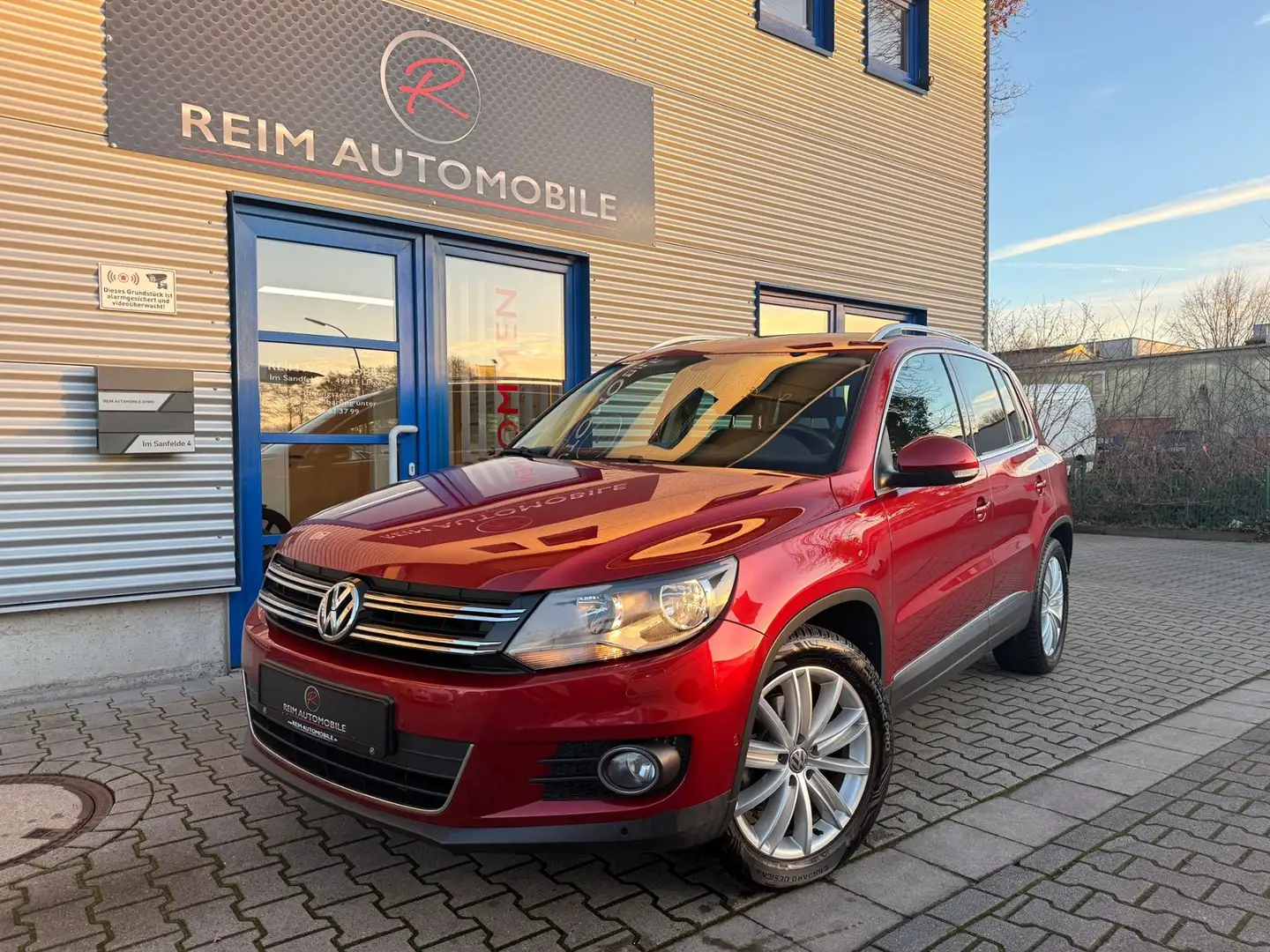 Volkswagen Tiguan 1,4 TSI Sport & Style BMT *TOP ZUSTAND*PANORAMA*T Rouge - 1