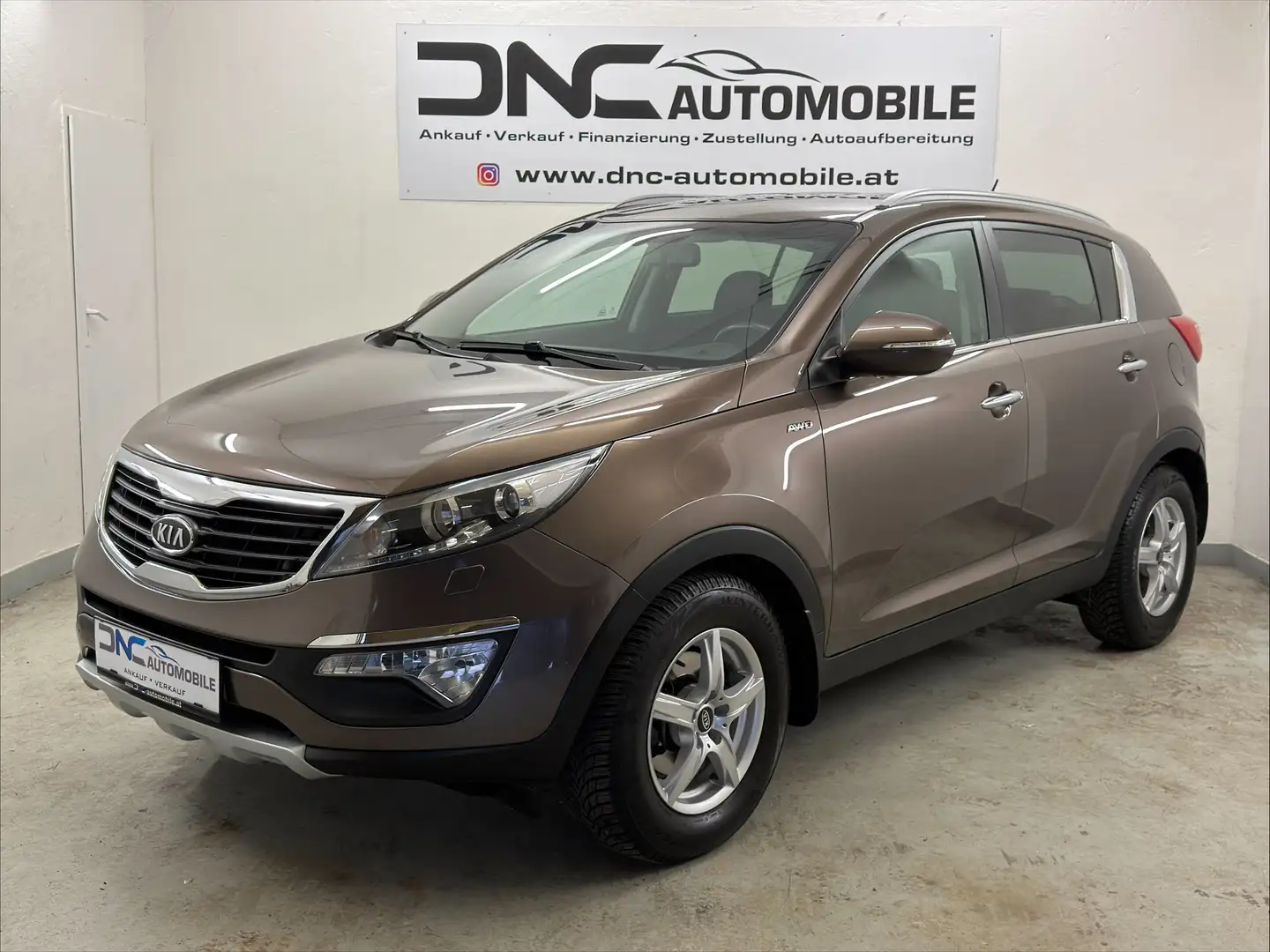 Kia Sportage Active 2,0 CRDi 4WD DPF Aut.*AHK*SHZ* Braun - 1