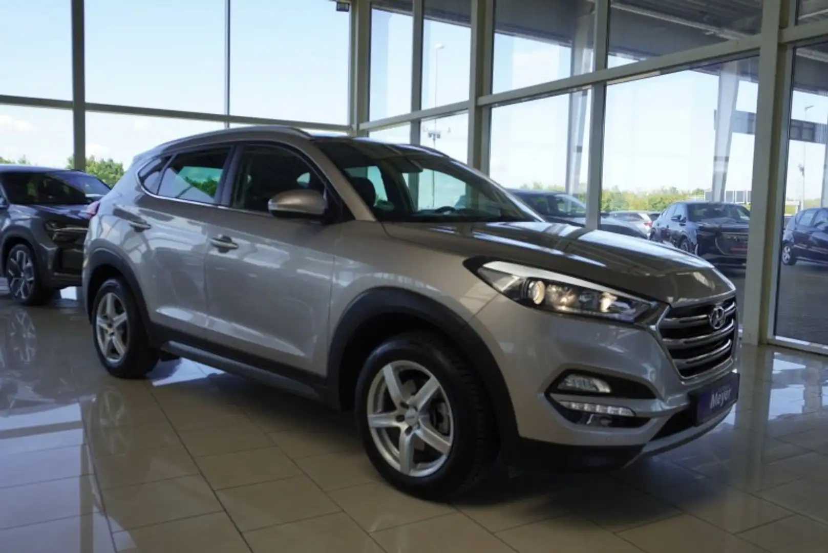 Hyundai TUCSON 1.6 177PS 4WD Aut.8*Alu/Navi/Winterp. Weiß - 1