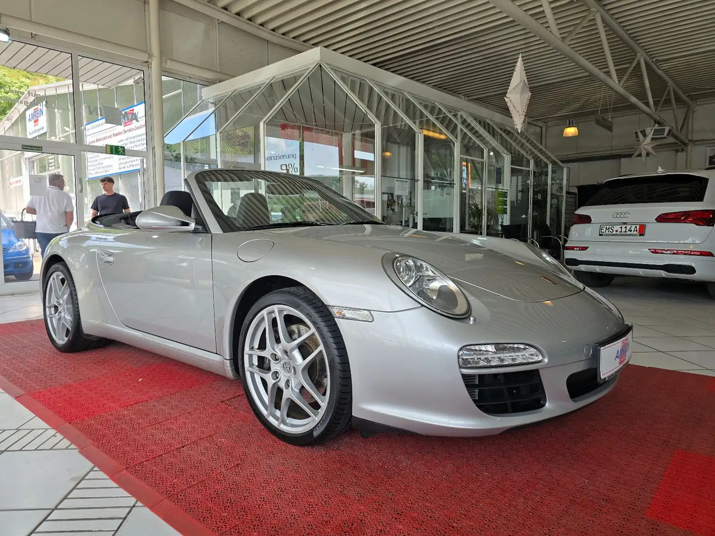 Porsche 997 911 Carrera Cabrio+NAVI+BI XENON+1. HAND+ Argento - 1