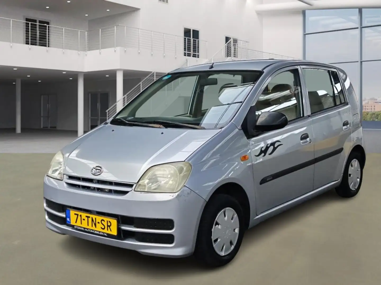 Daihatsu Cuore 1.0-12V Tokyo/ STUURBEKRACHTEGING Grau - 1