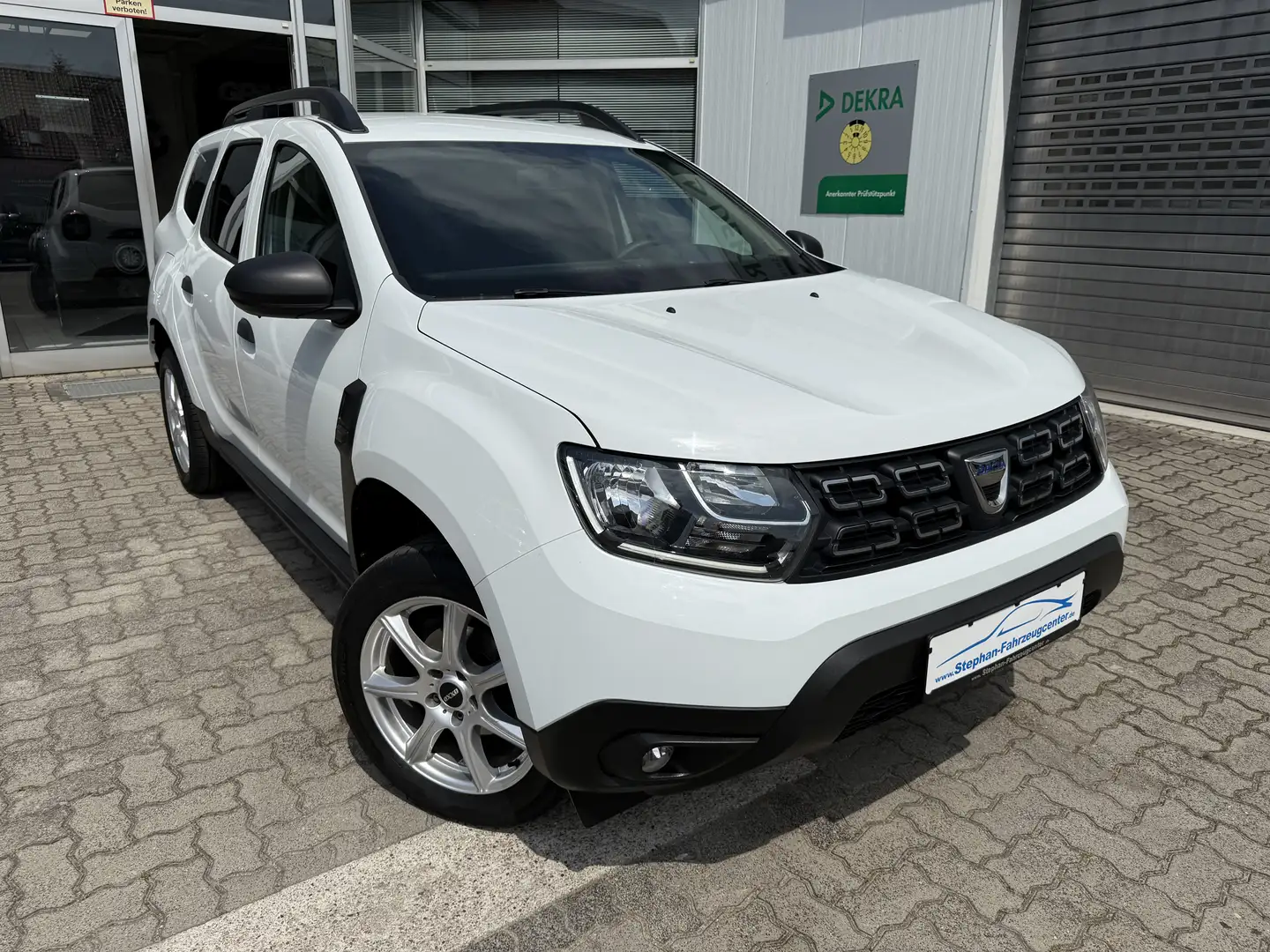 Dacia Duster Deal 5trg. mit Klima/Navi/Alus/ABS/ESP/ZV/EFH/ Fehér - 1