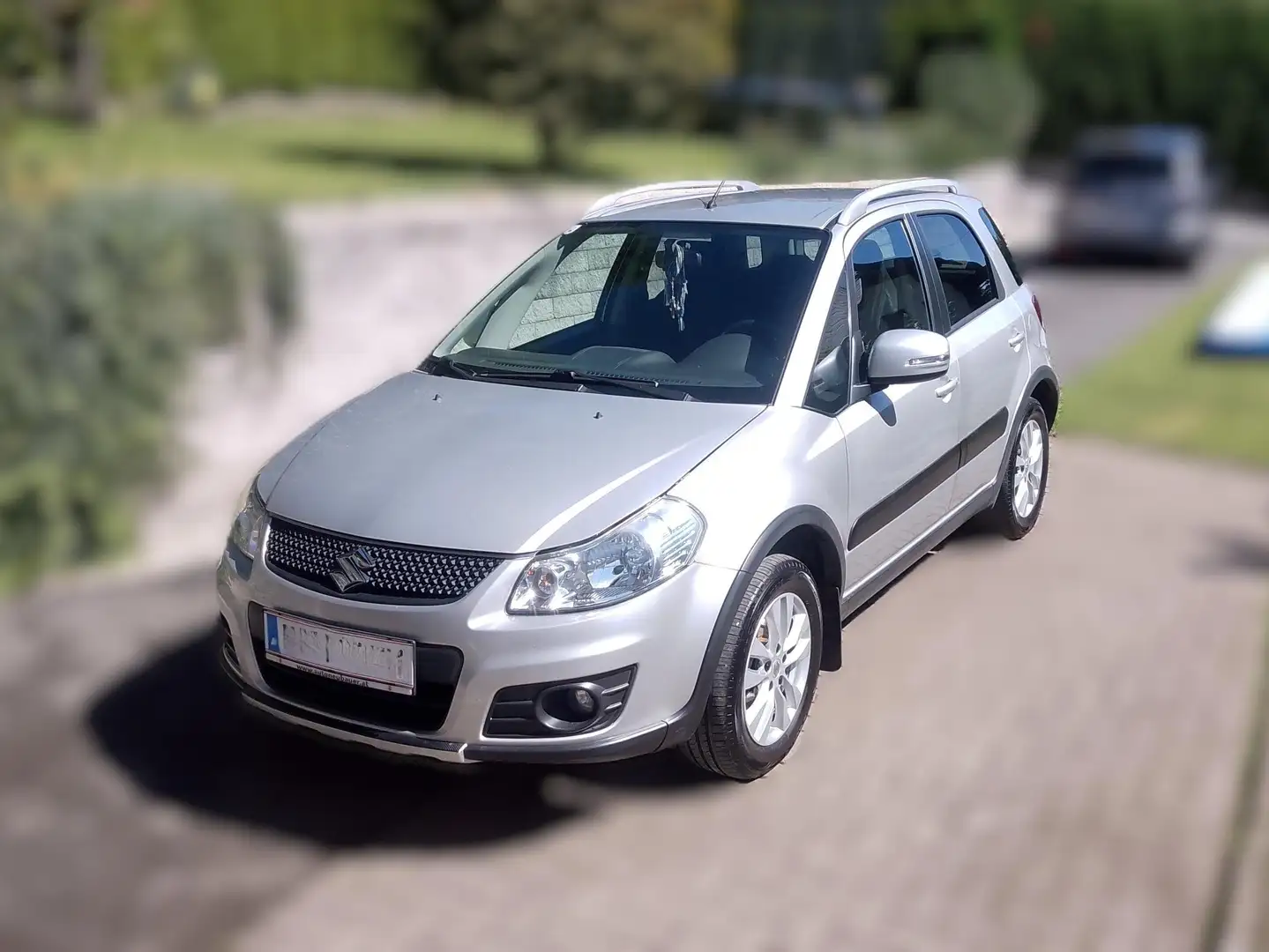 Suzuki SX4 SX4 1,6 GLX Traveller 4x4 Silber - 1