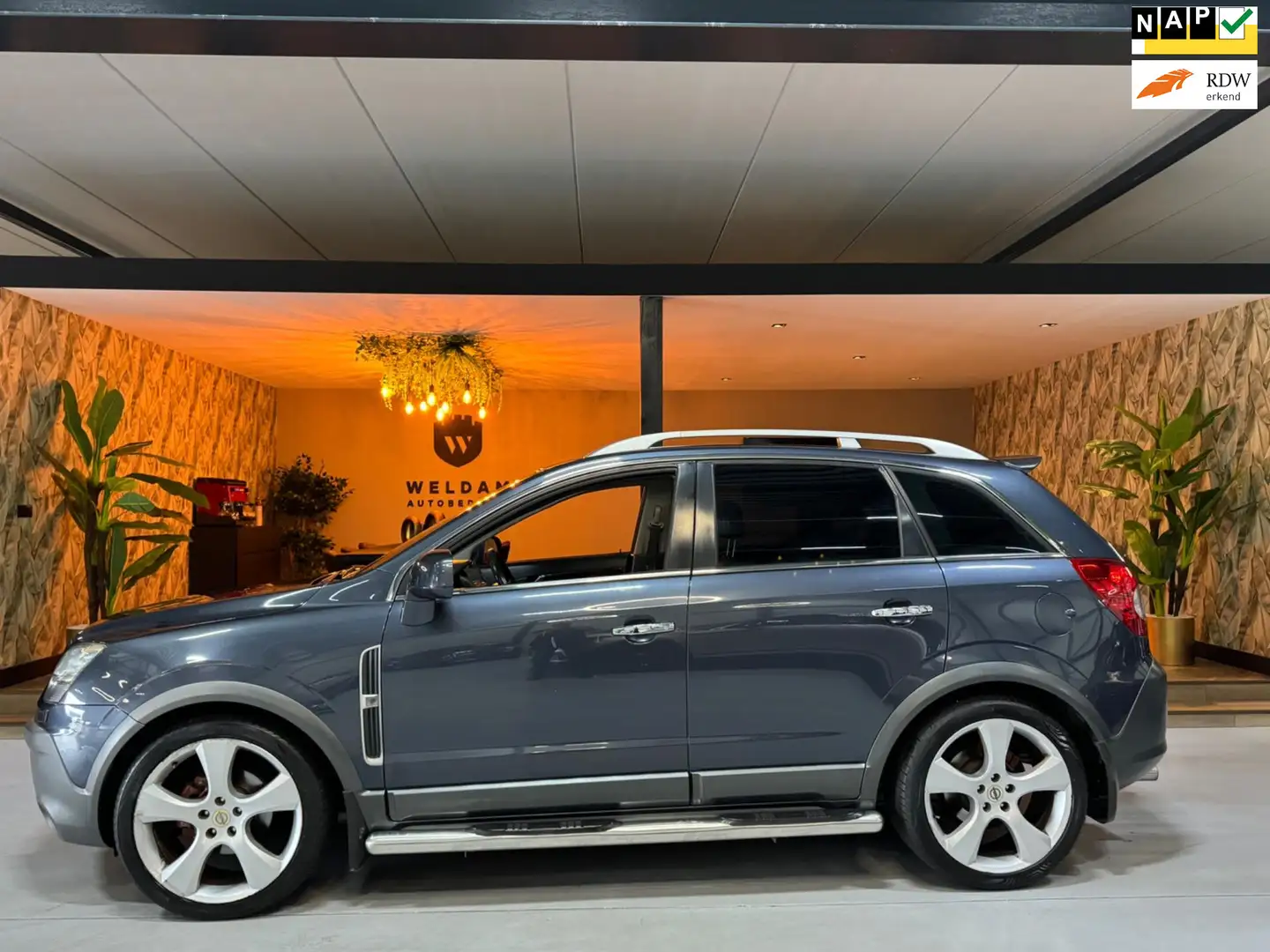 Opel Antara 3.2 V6 Cosmo Nap Trekhaak Pano Camera PDC StoelVW Blauw - 1