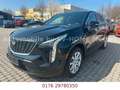 Cadillac XT4 350T Luxury AWD*1 Hand* Schwarz - thumbnail 1