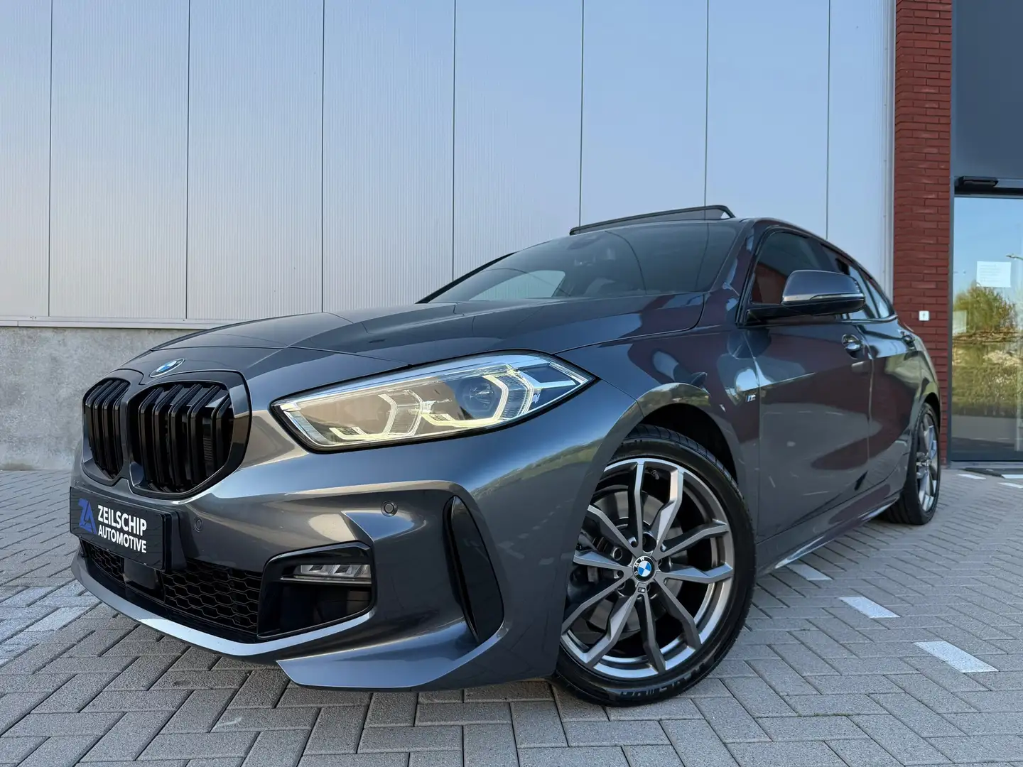 BMW 120 1-serie 120i High Executive M-Sportpakket|Pano|Tre Grau - 1