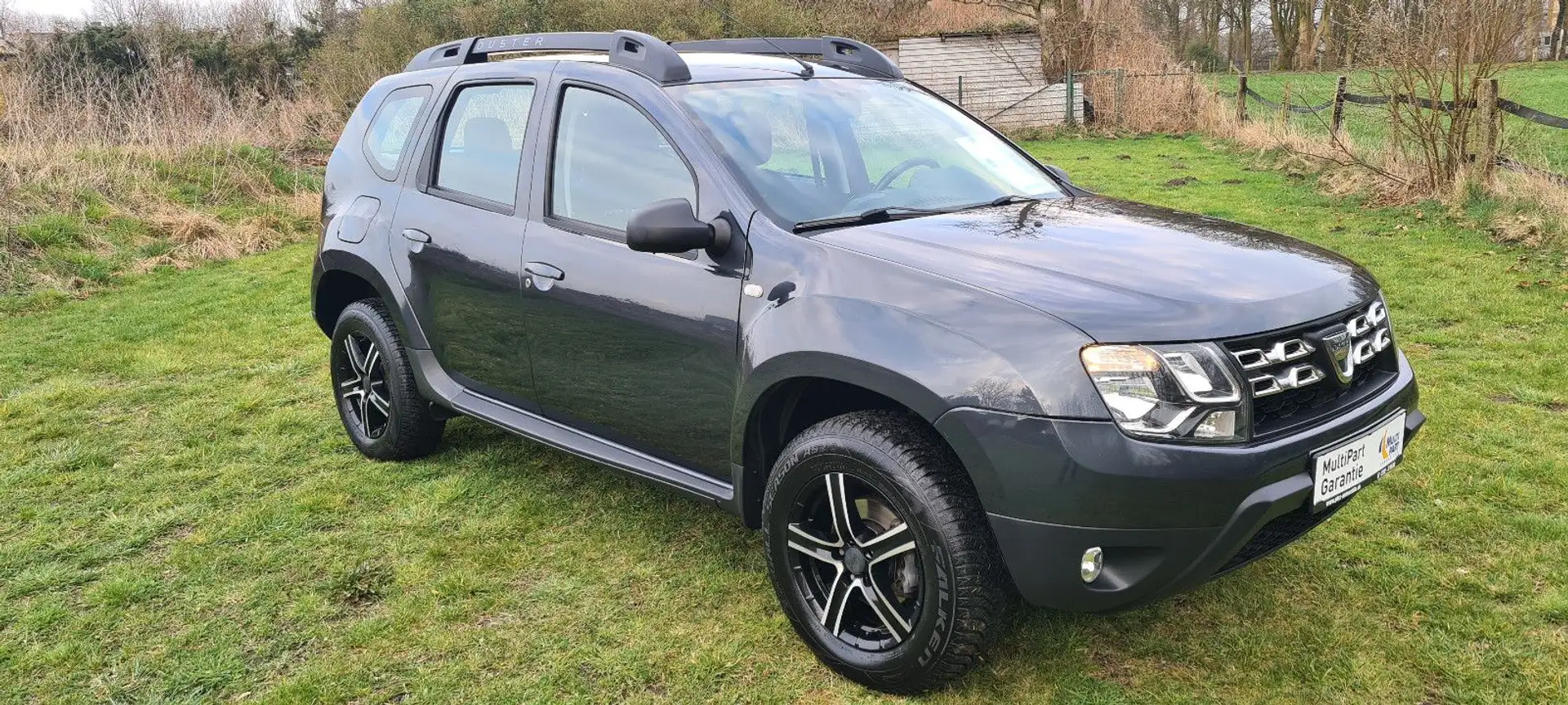 Dacia Duster Laureate*Navi*Tempomat*PDC*Klima*Isofix* Grau - 1