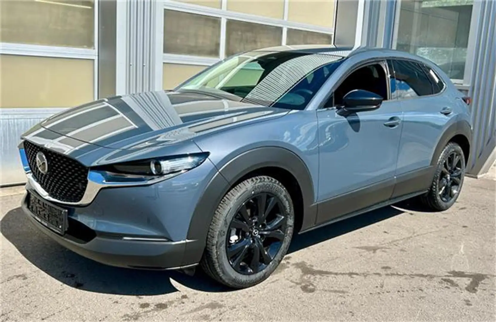 Mazda CX-30 e-Skyactive G140 Homura Grau - 1