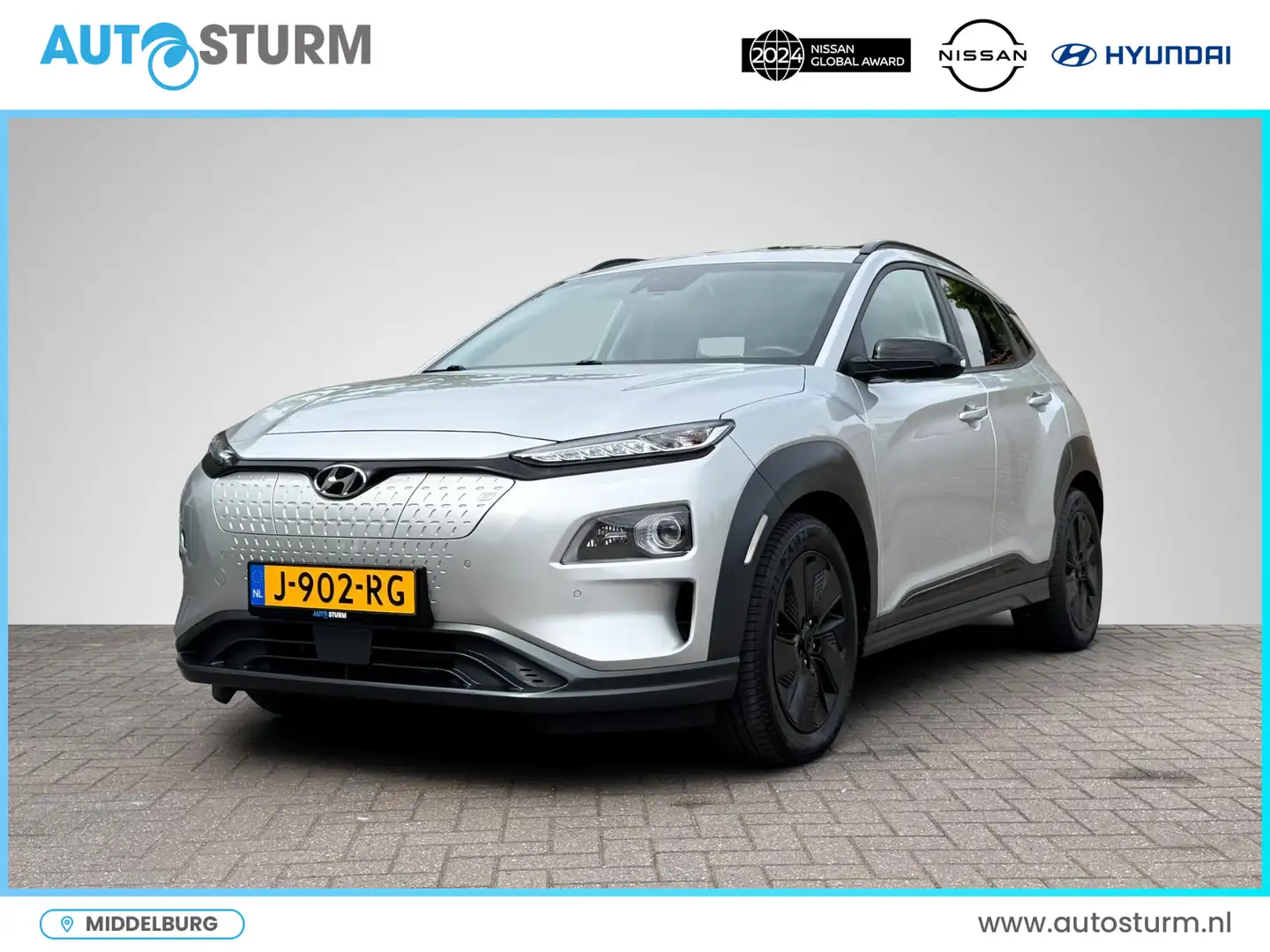 Hyundai KONA EV Premium 64 kWh 3-Fase Lader | Schuif-/Kanteldak Серебристый - 1
