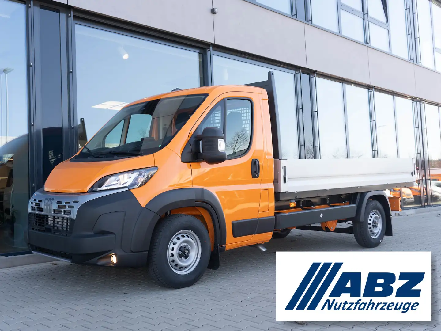 Fiat Ducato Maxi Pritsche L2S / 10-Zoll Navi + AHK Orange - 1