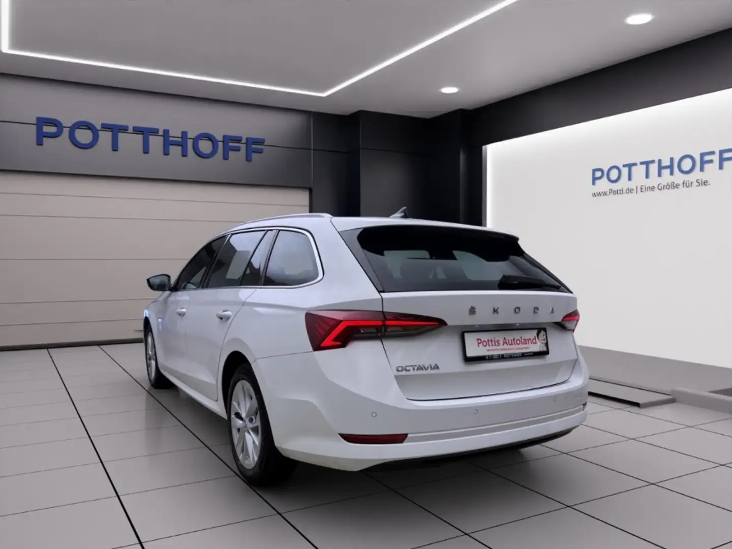 Skoda Octavia Combi 2.0 TDI DSG STYLE NAVI PDC SITZHZG ACC Weiß - 2