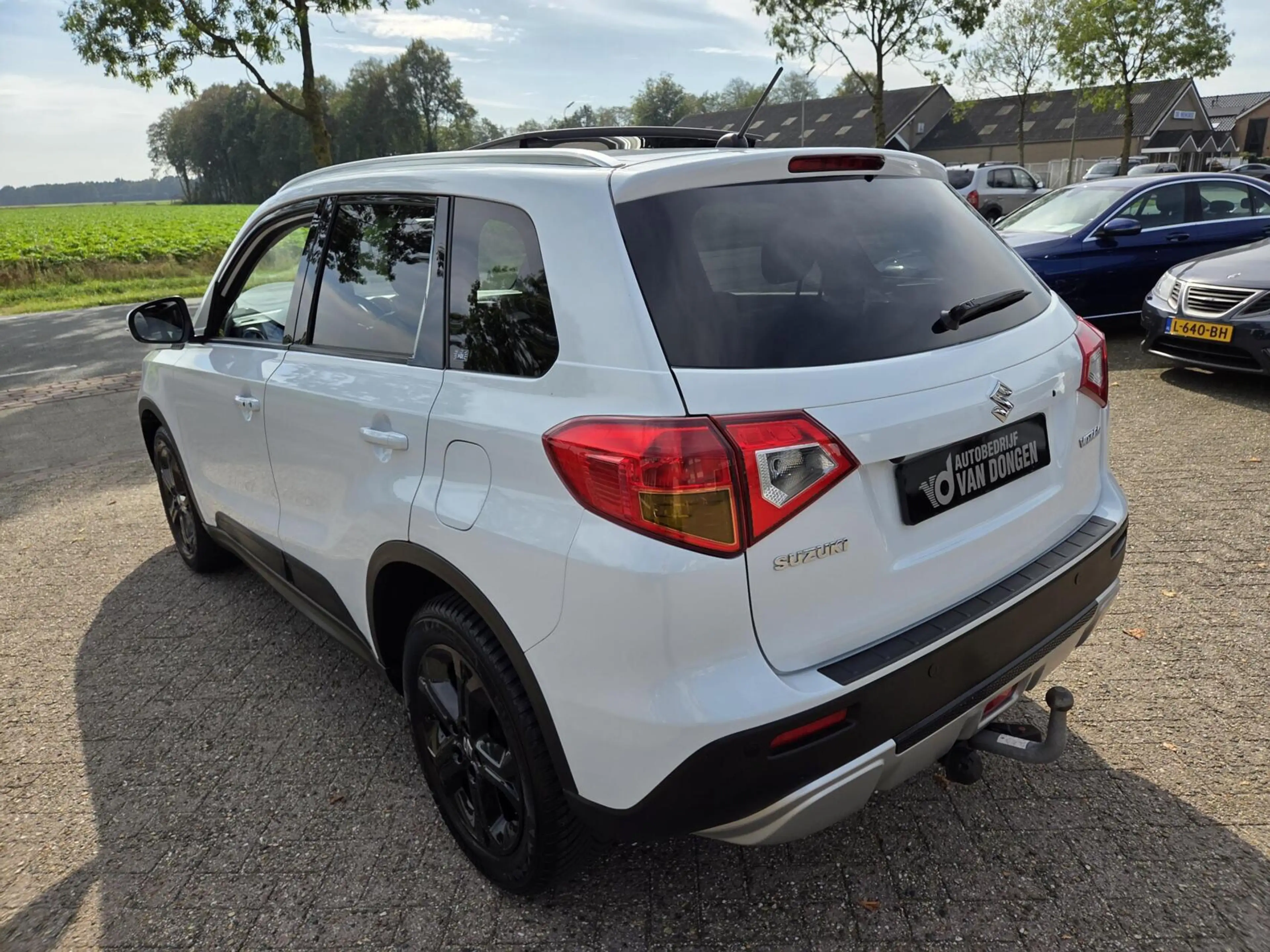 Suzuki Vitara 1.6 High Executive Automaat | Parelmoer / Panorama — photo 24