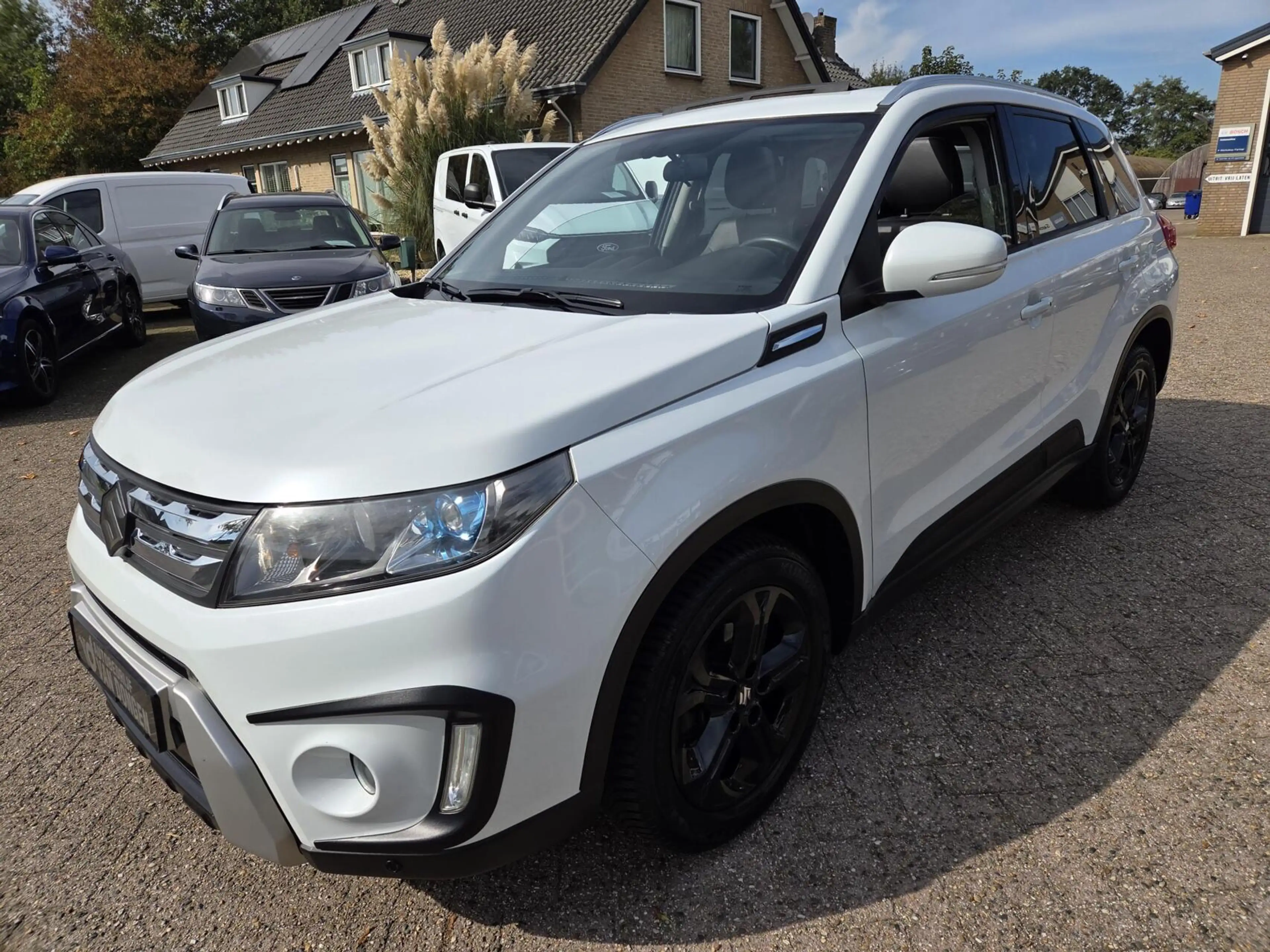 Suzuki Vitara 1.6 High Executive Automaat | Parelmoer / Panorama — photo 21