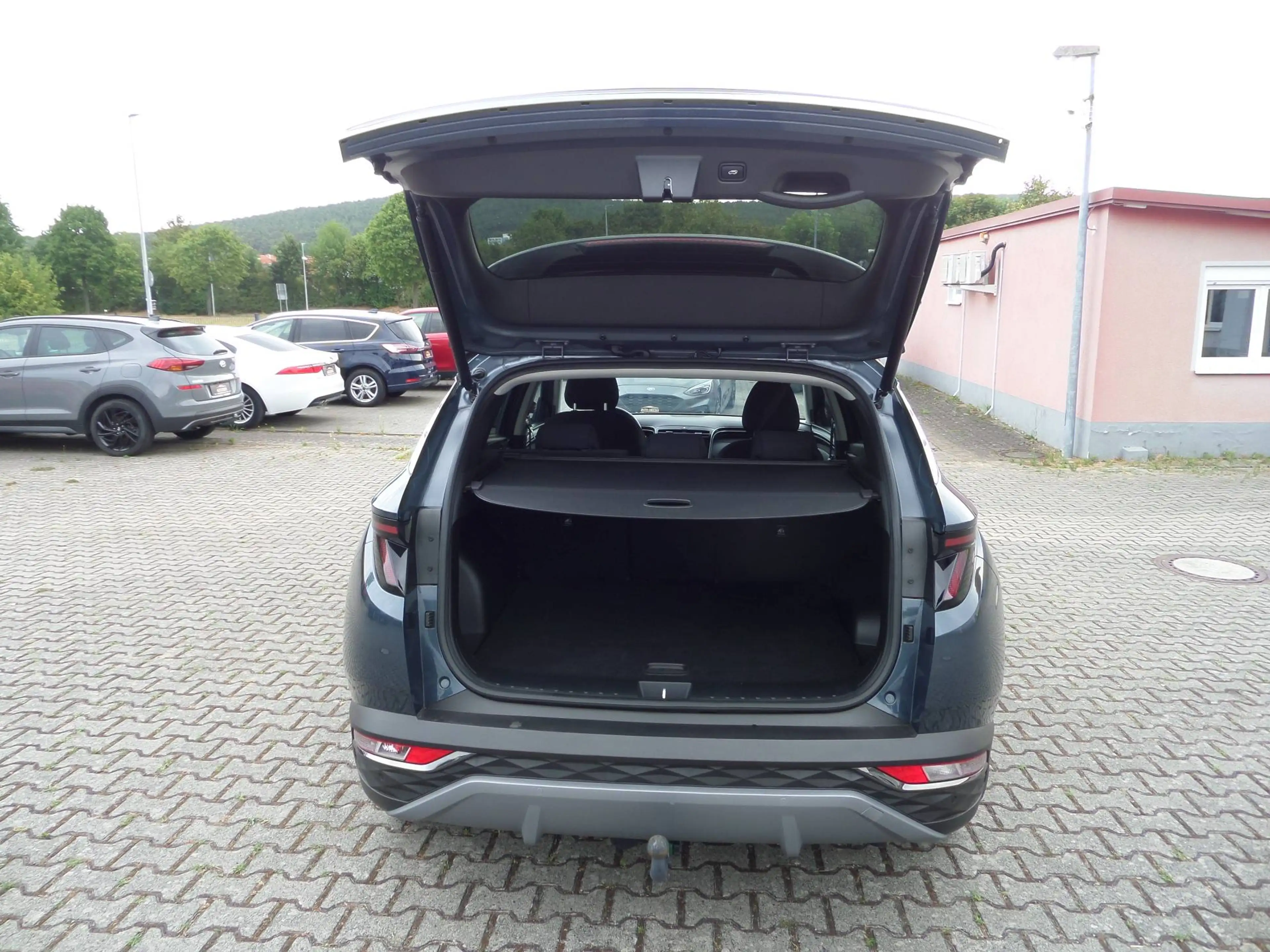 Hyundai TUCSON Mild-Hybrid 2WD+Fahrschulauto+AHK+Navi+Cam+SHZ+PDC+ACC+Sportpaket — photo 15