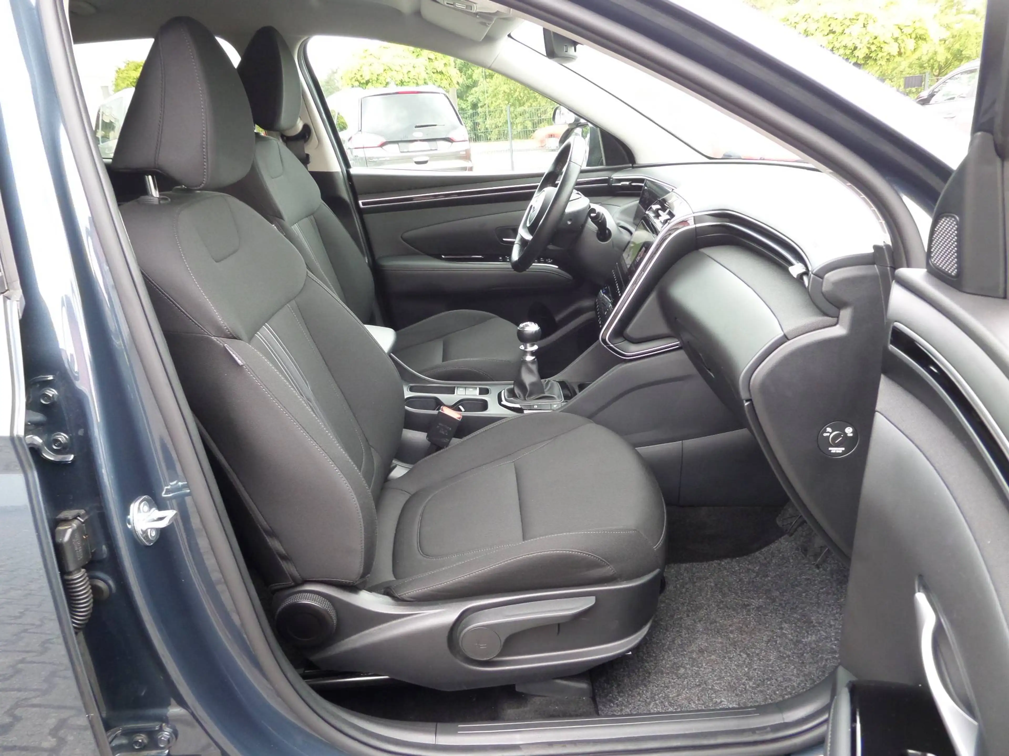 Hyundai TUCSON Mild-Hybrid 2WD+Fahrschulauto+AHK+Navi+Cam+SHZ+PDC+ACC+Sportpaket — photo 13