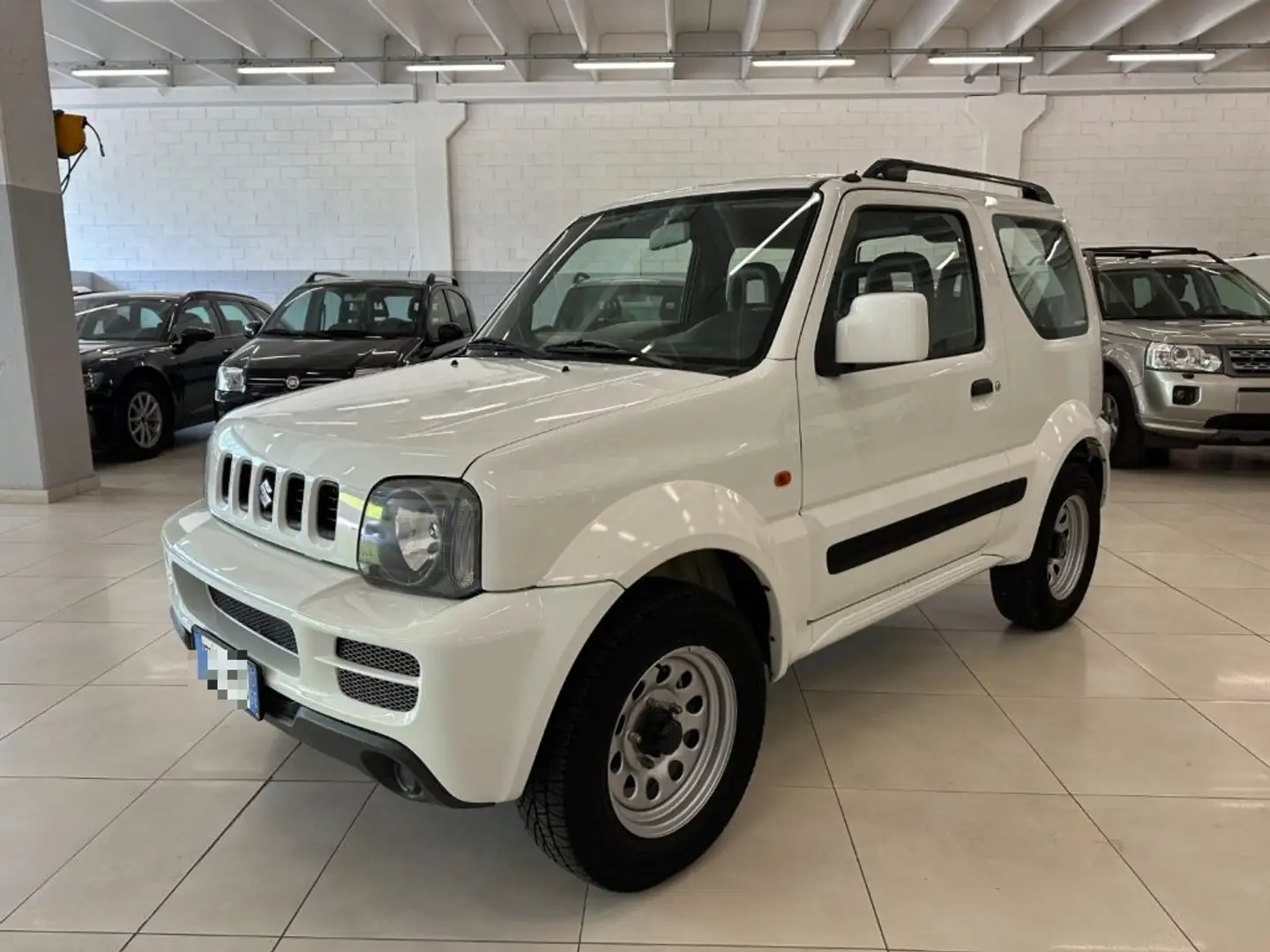 Suzuki Jimny 1.3i 16V cat 4WD JLX Bianco - 1