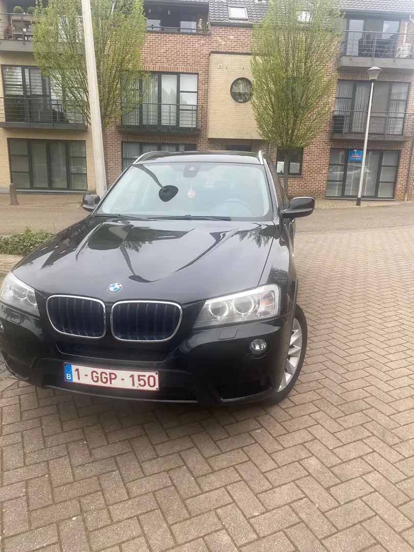 BMW X3 sDrive18d full option Zwart - 1