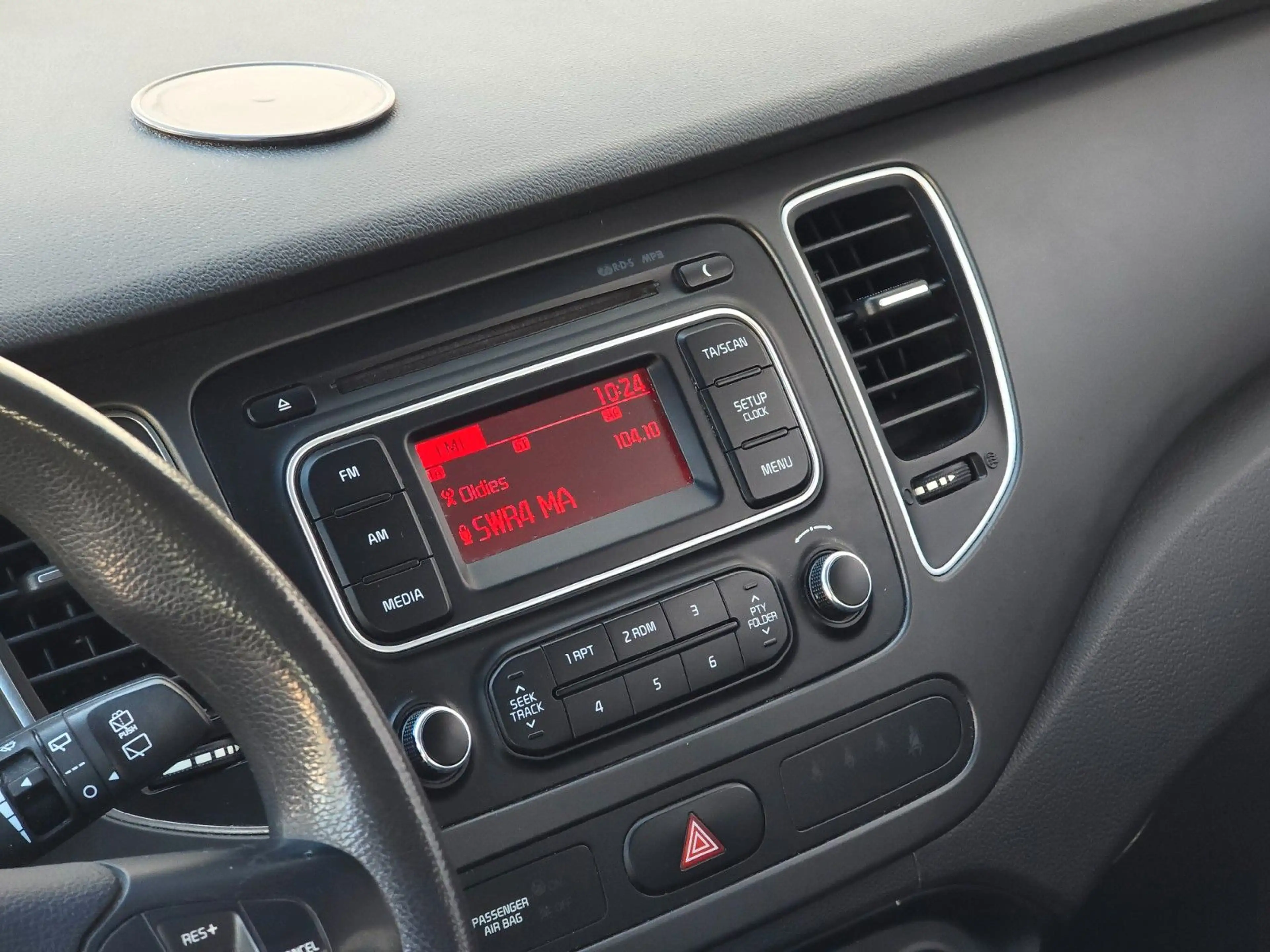 Kia Carens — photo 13