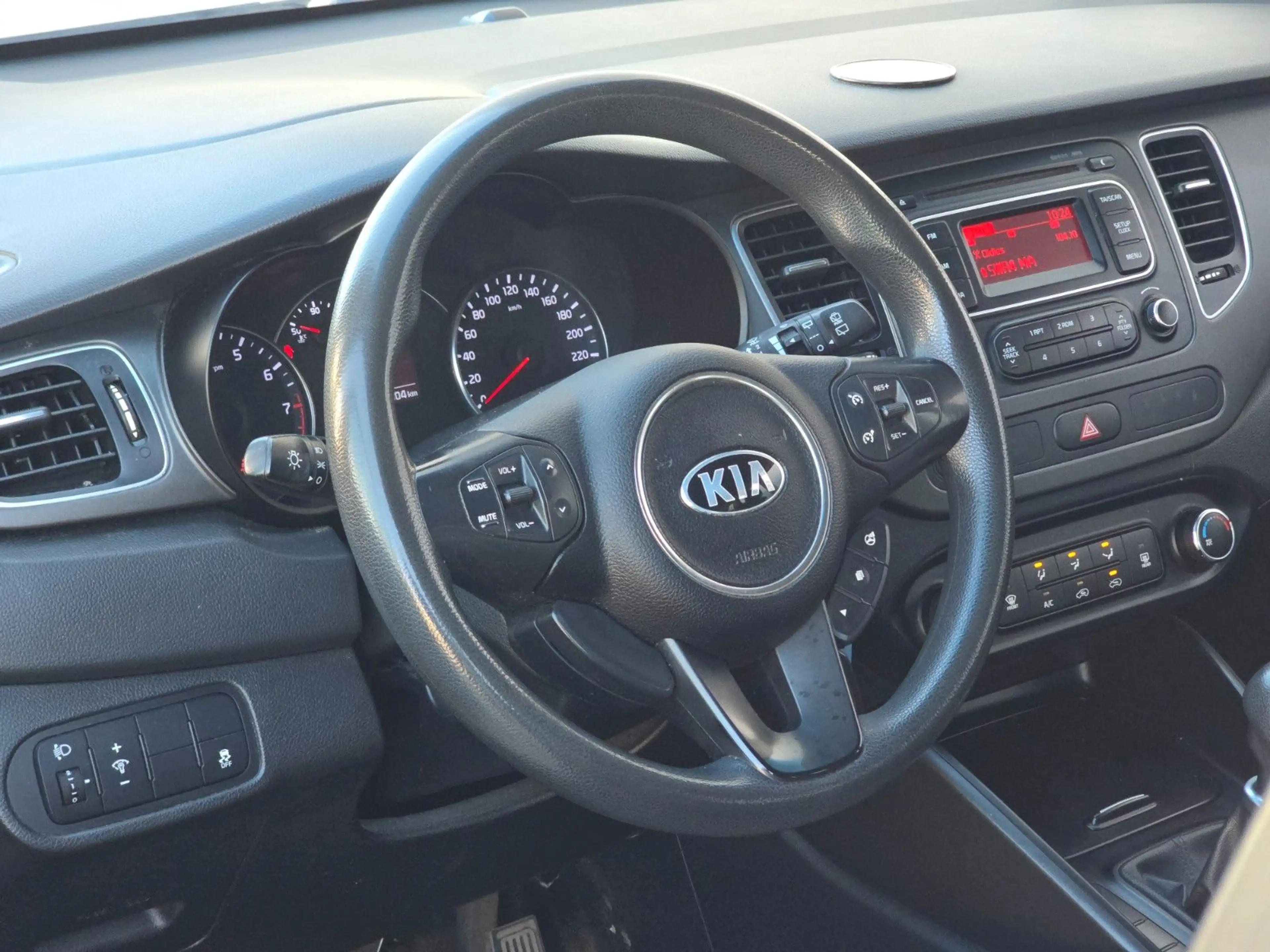 Kia Carens — photo 11