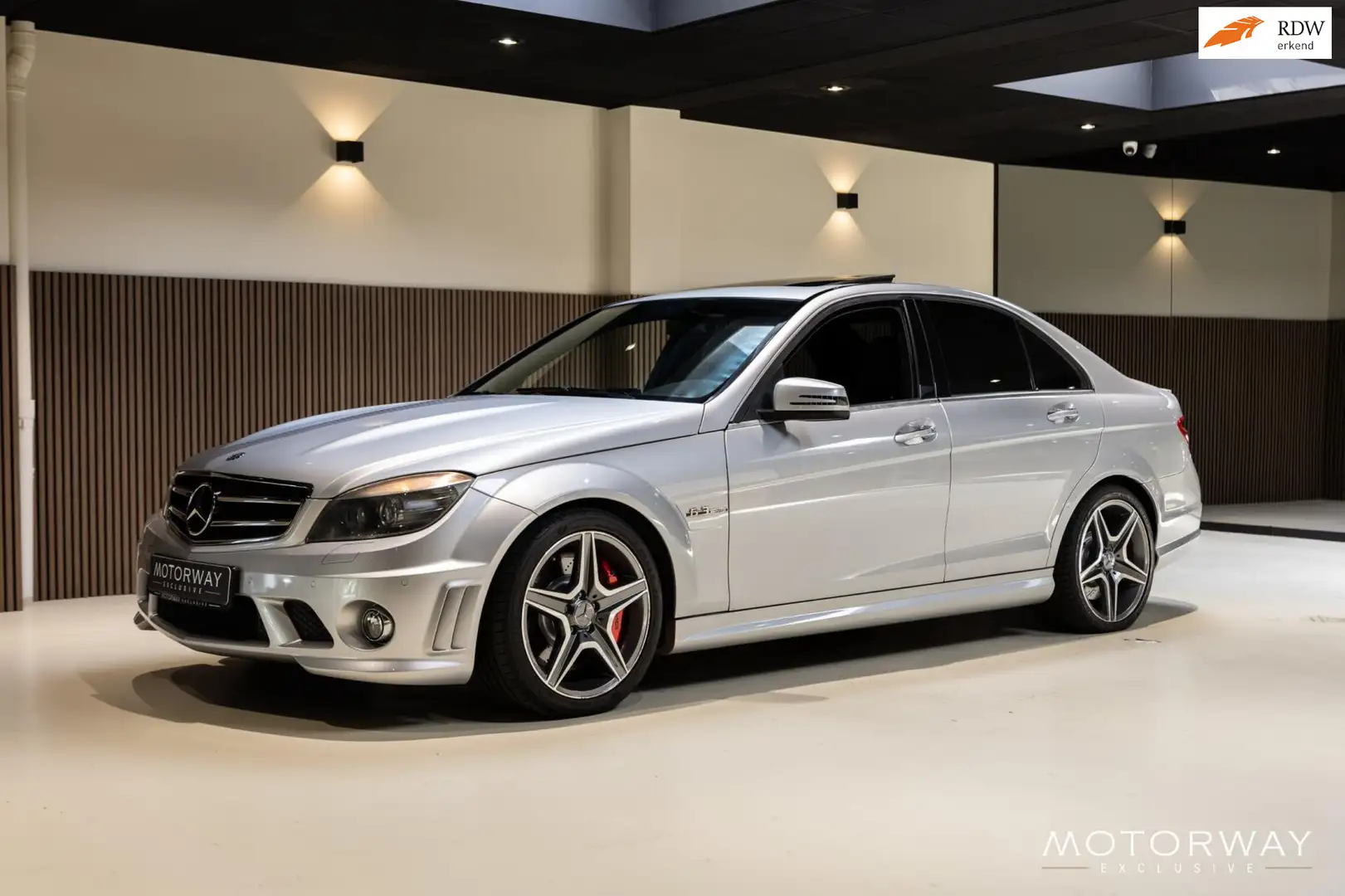 Mercedes-Benz C 63 AMG W204|SCHUIFDAK|LEER|AUTOMAAT|CAMERA|YOUNGTIMER Grijs - 1