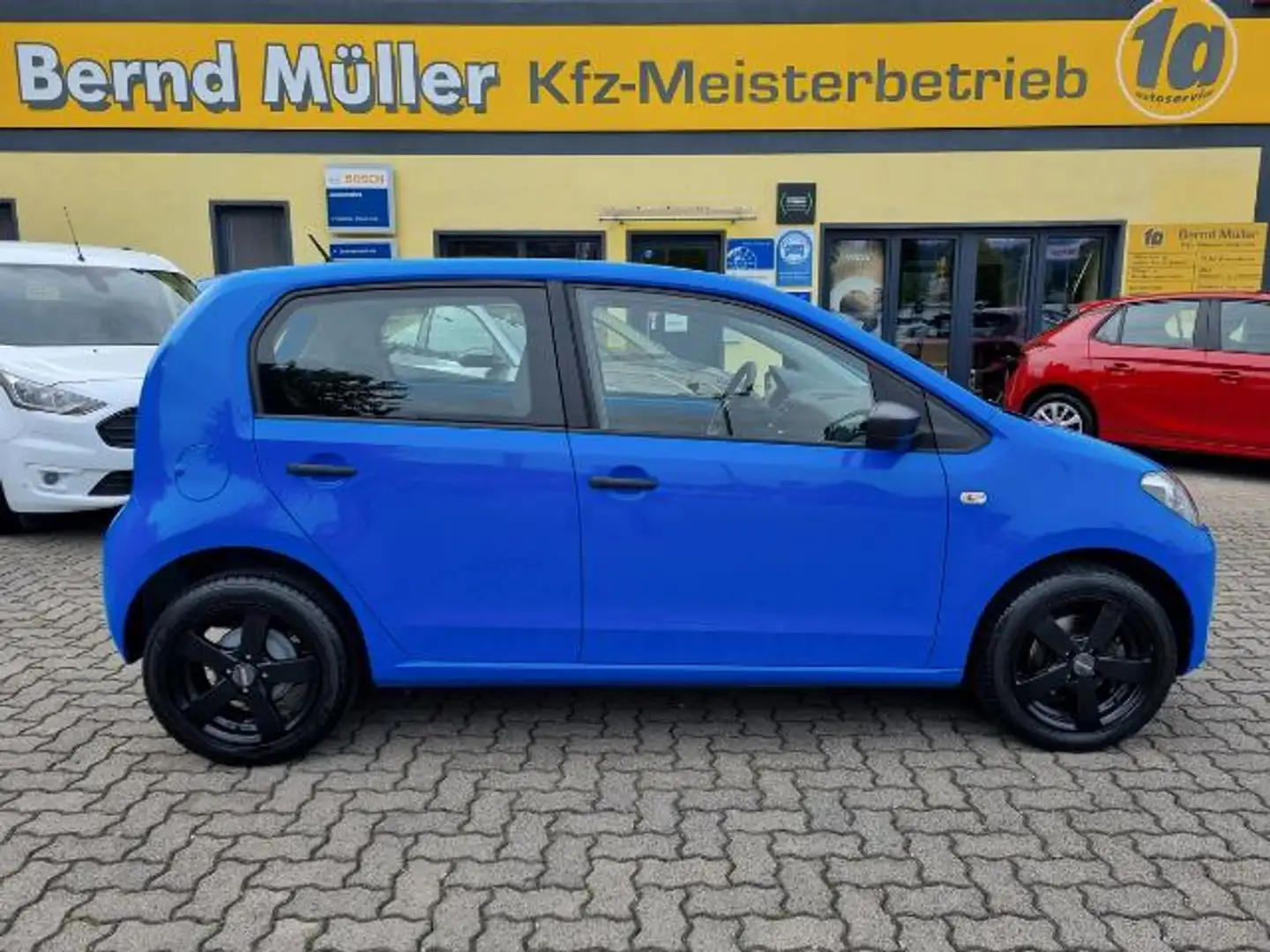 Volkswagen up! 1.0 Coul & Sound Blau - 1
