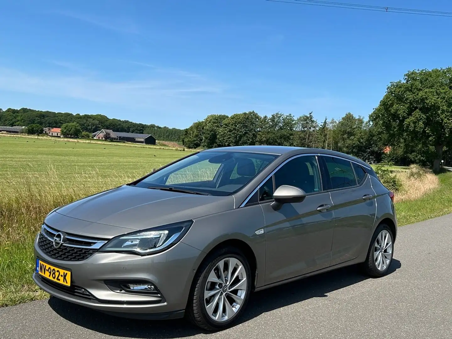 Opel Astra 1.4 Innovation, Navi, Cruise, ECC, PDC, Isofix Grijs - 2