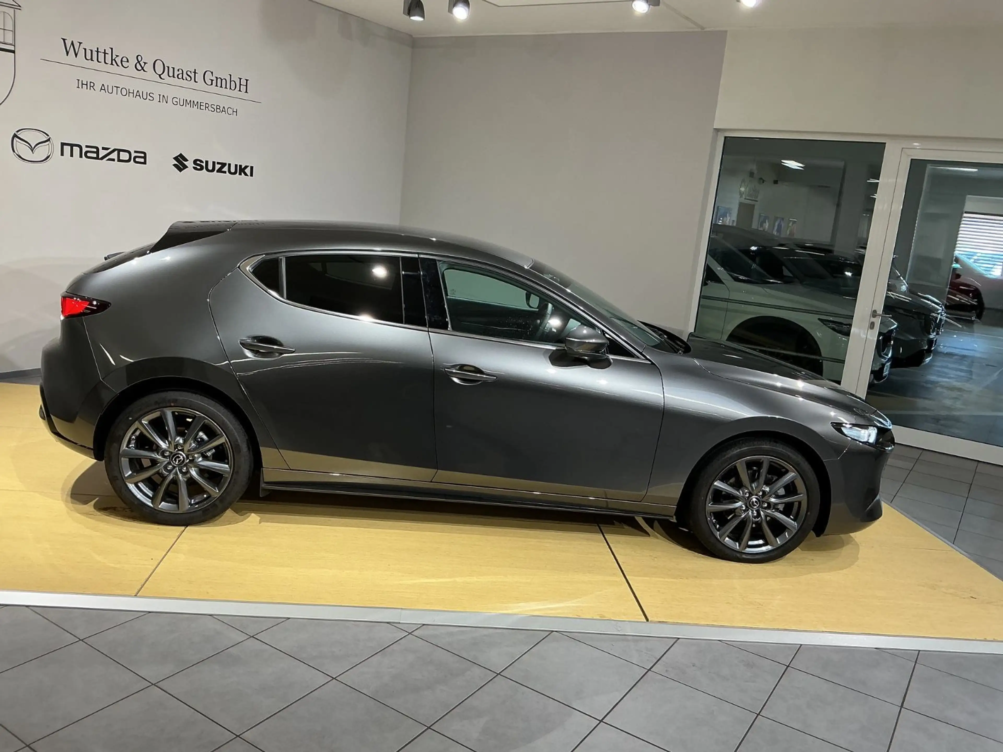 Mazda 3 Exclusive-Line *BOSE*360°*Matrix*Carplay* — photo 2